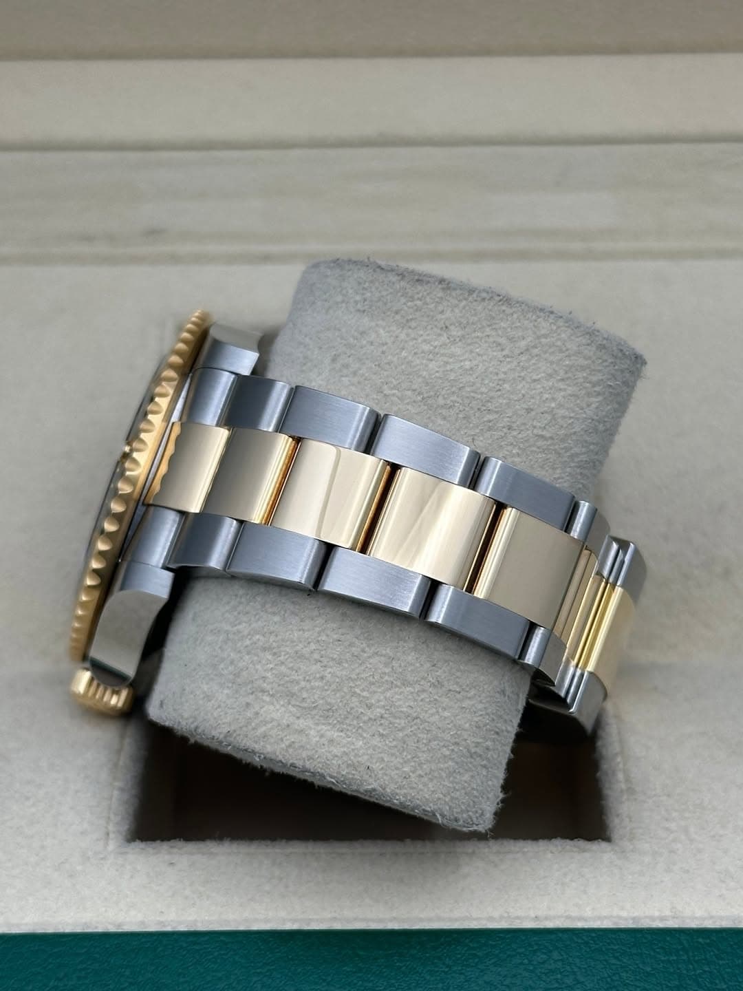 May be an image of wrist watch and jewelry