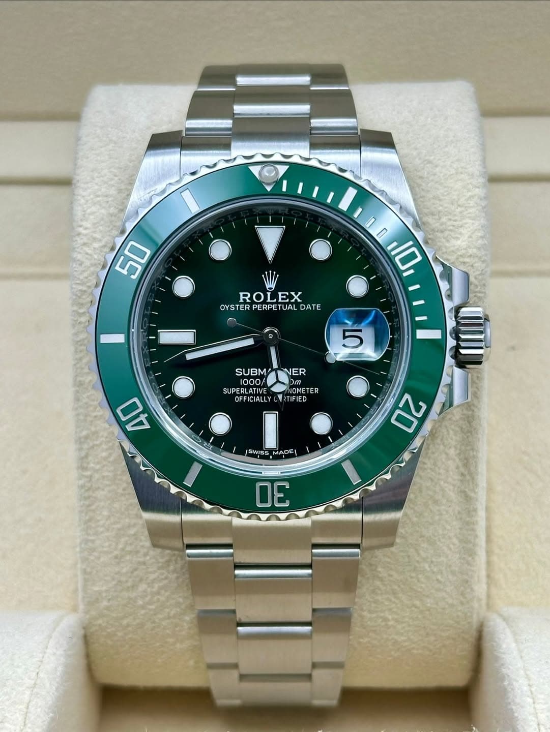 May be an image of wrist watch and text that says '50 ROLEX OYSTER TERPERPETUAL ER PERPET UAL DATE 100 10 5 SUBM' SUBMOTNER NER 1000/ SUPERL LATIVE RLATIE લহ HOMETE OME OMETER ER…