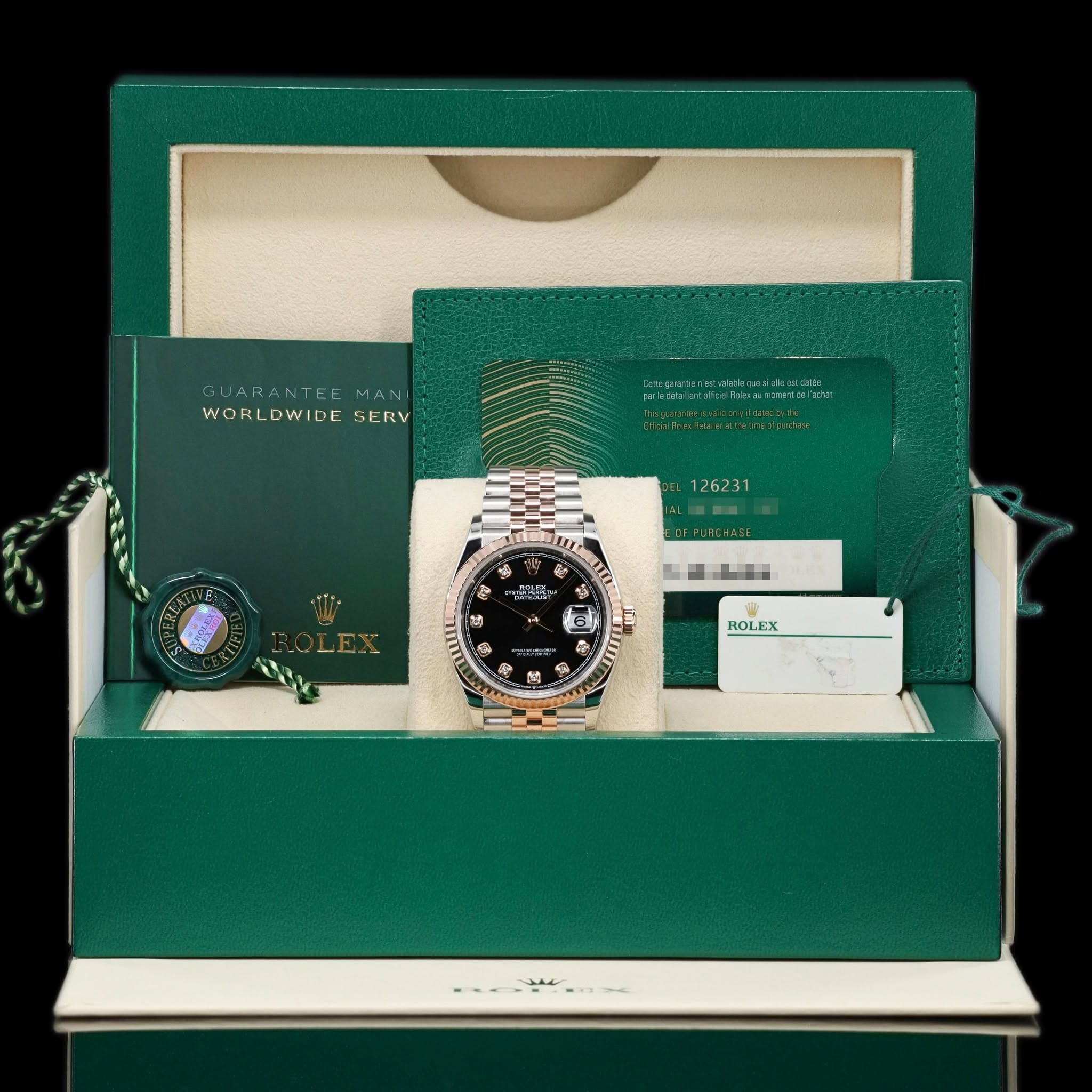 May be an image of wrist watch and text that says 'SUARANTEE GUAHANTEEMAN MAN ANTEEMA WORLDWIDFSERV WORLDWIDE SERV 126231 -PORC-ASE 通 美 時 去 A 安 16 ل ဗုည့် Q ፪ 感 種佳 監行 فی ROL.EX…