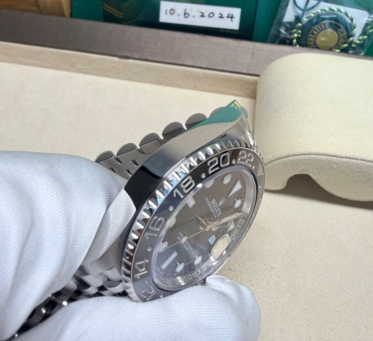 May be an image of wrist watch and text