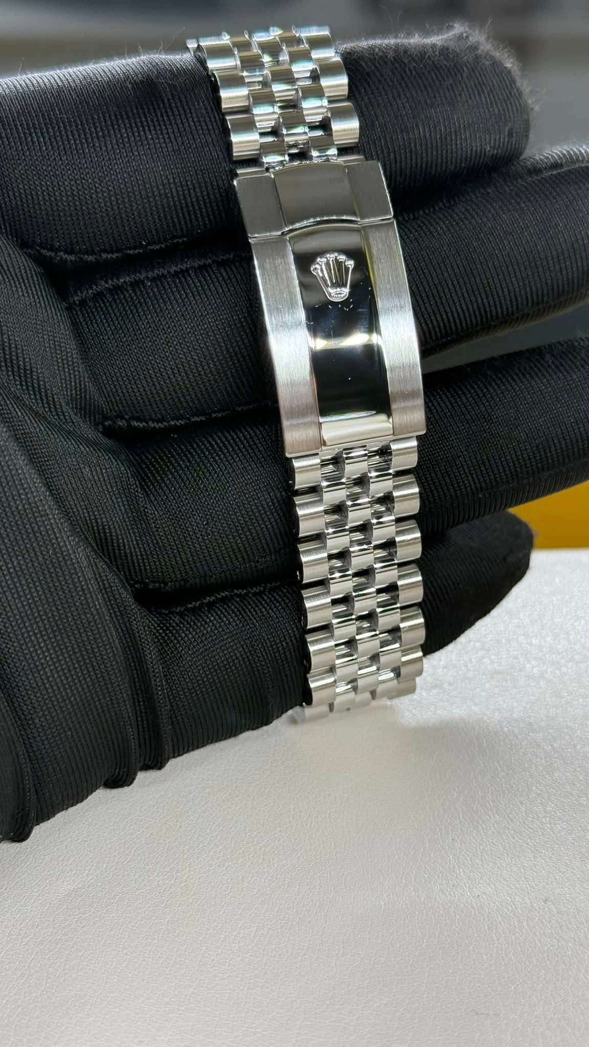 May be an image of wrist watch