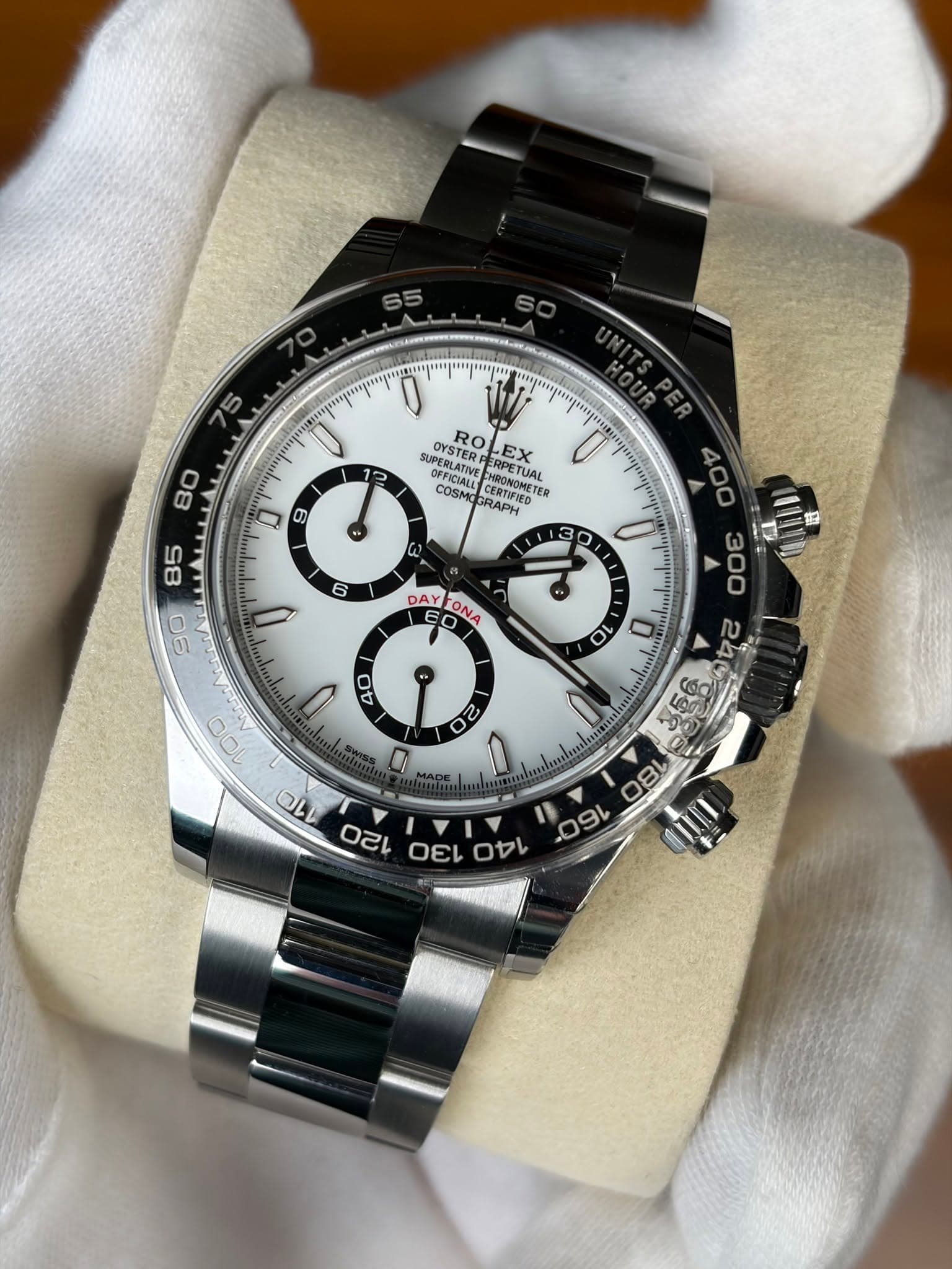 May be an image of wrist watch and text that says '75 ማ' 12 ROL EX RO SUPERLATIW SUPERLADVE DEOLRE OYSTERE COSMO OFFICIALL ALLICERTIVER THUNDNETE HRONOMETE ER AEETOE RPETUAL…