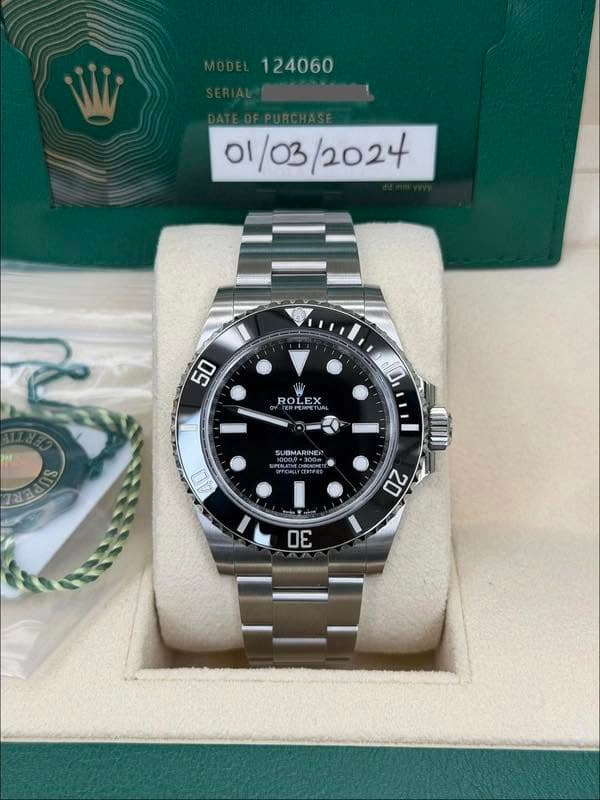 May be an image of wrist watch and text that says ' /03/2024 1٥ 01/03 /2024 50 ROLEX ROLE ROL TERPERFETUA d0 SUBMARINER ИФ ЮC0P*30R 7្ '
