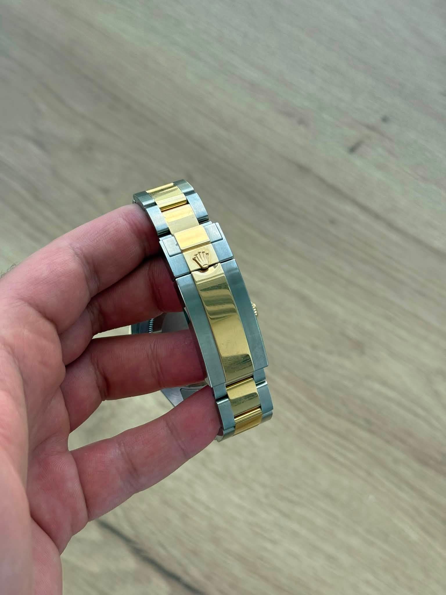 May be an image of wrist watch