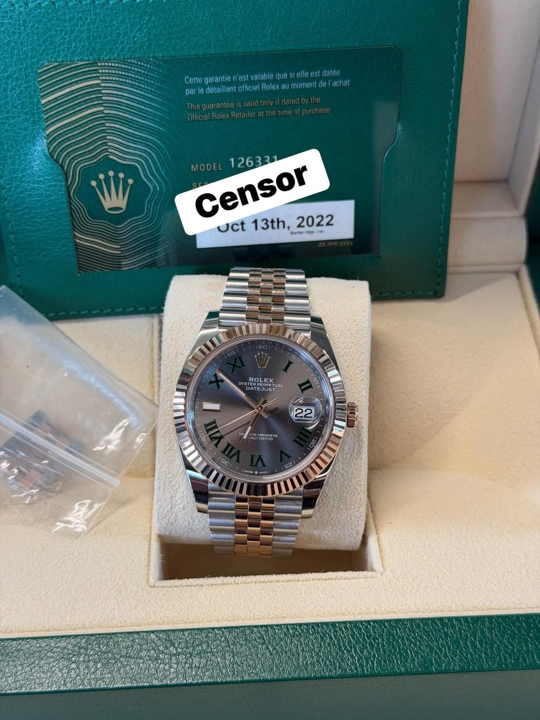 May be an image of wrist watch and text