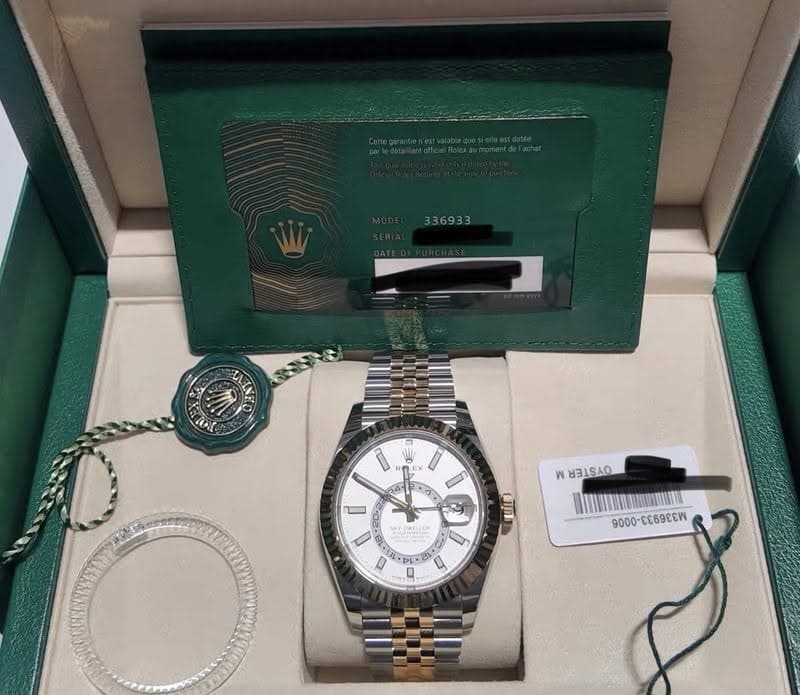 May be an image of wrist watch and text