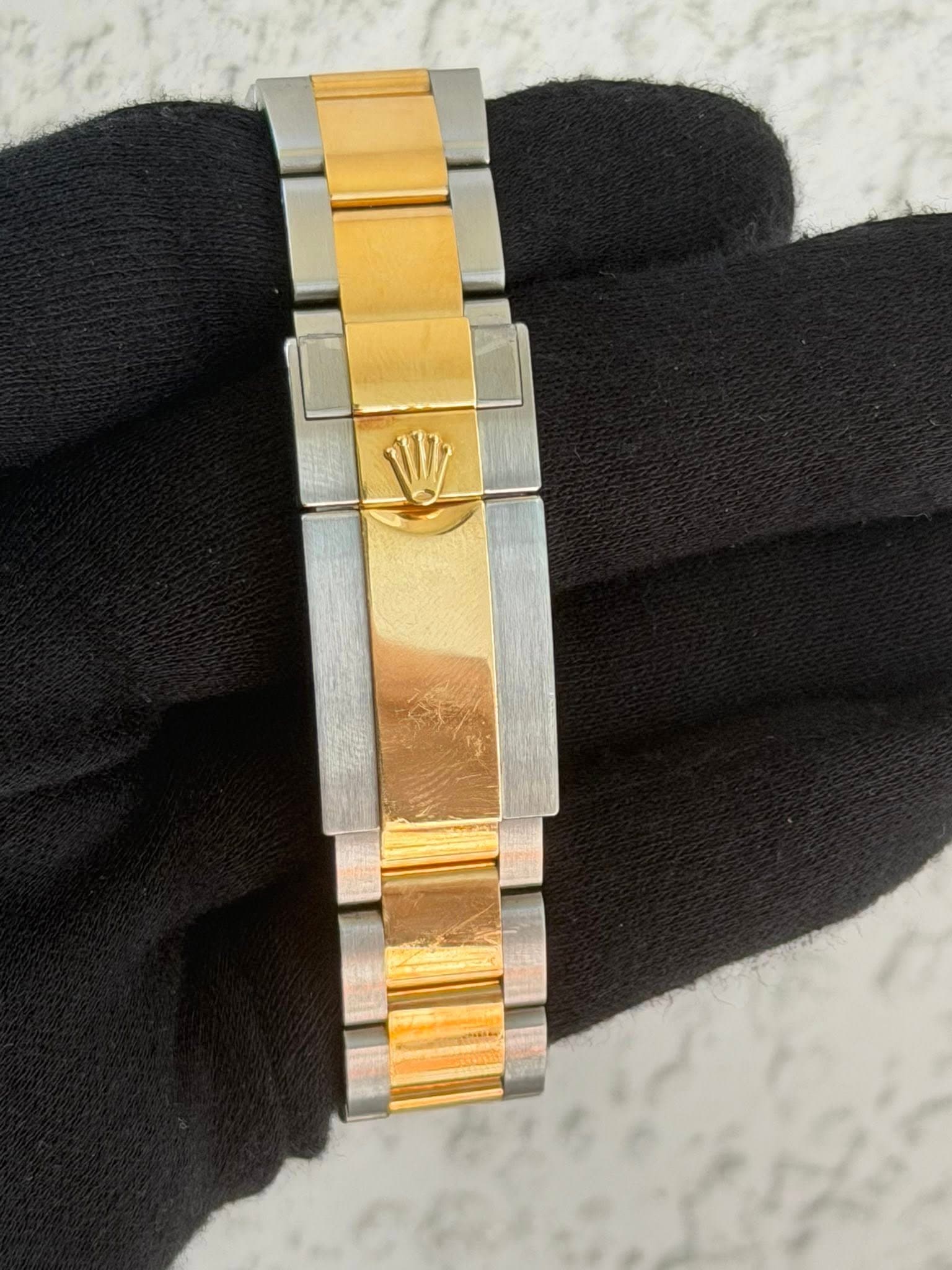 May be an image of wrist watch
