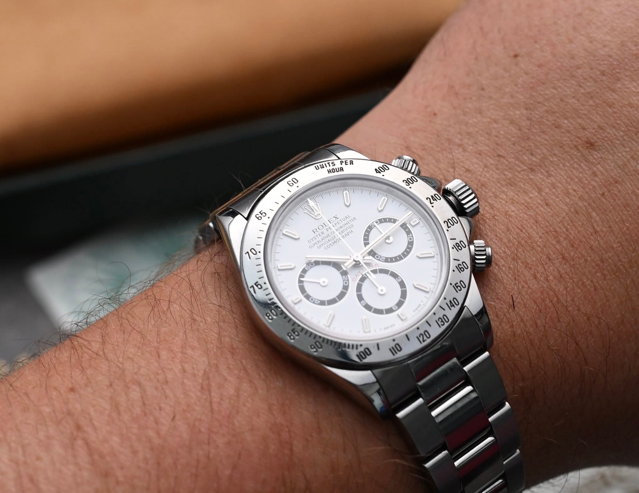 May be an image of wrist watch and text