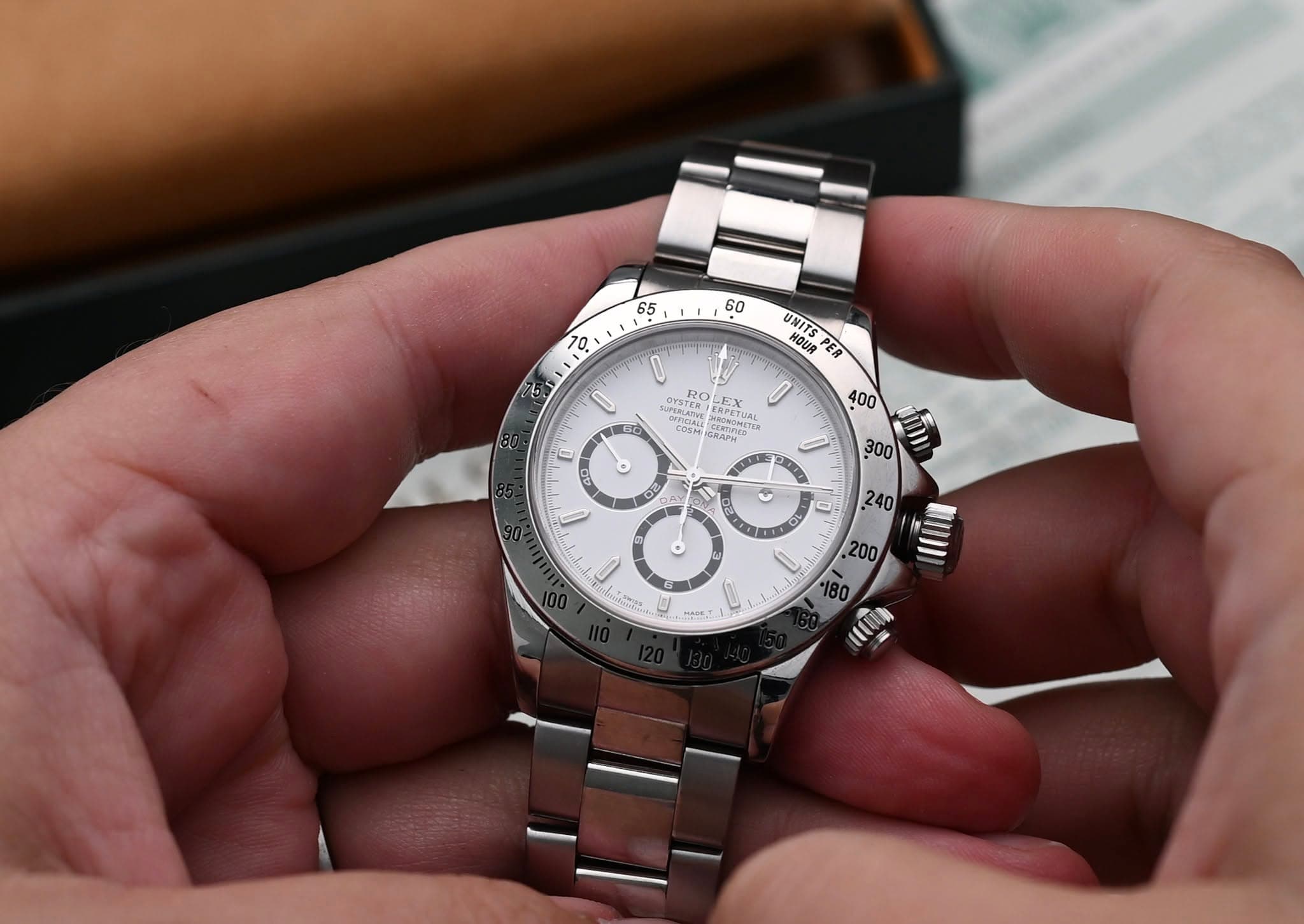 May be an image of wrist watch and text