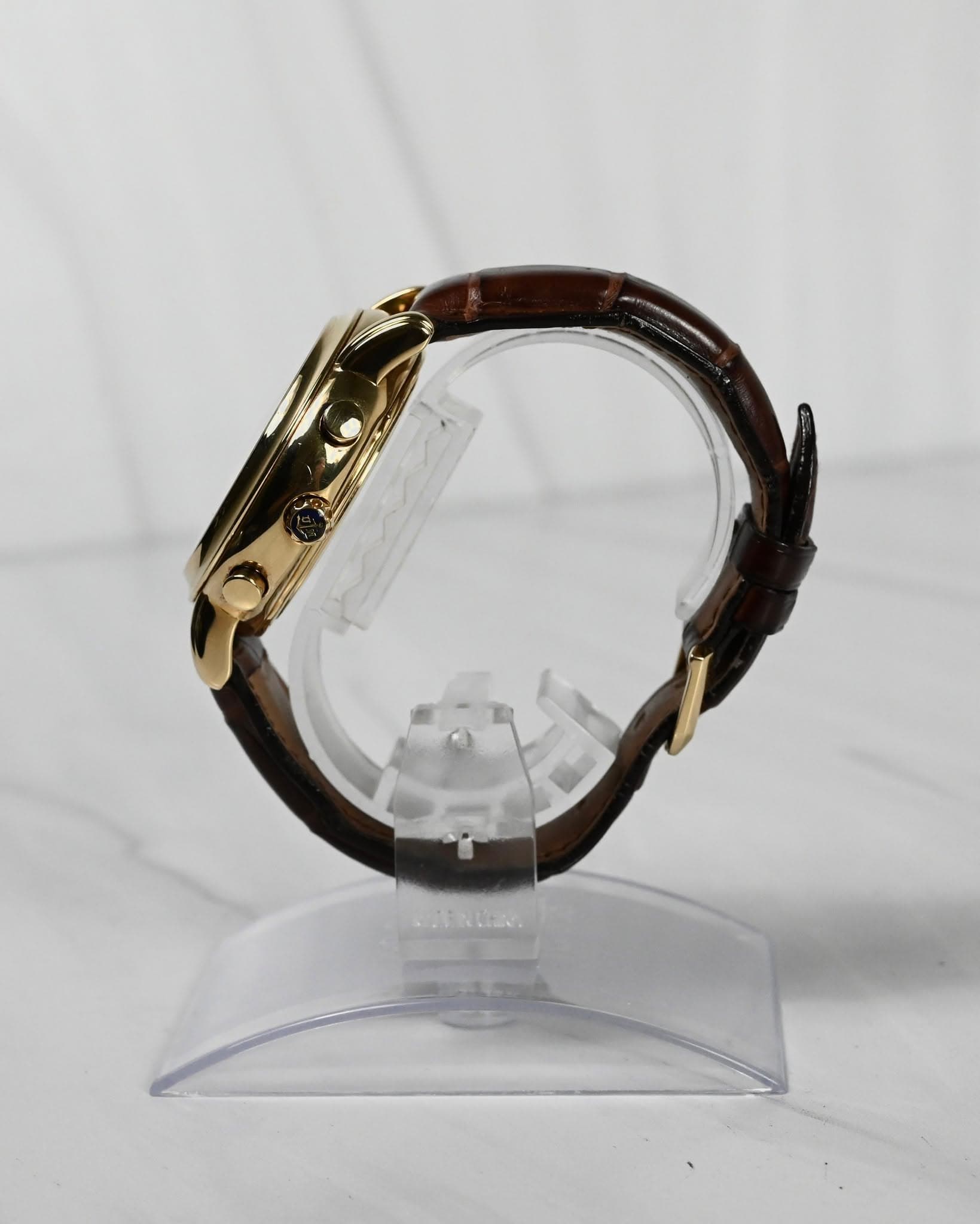 May be an image of jewelry, leather, brass, wrist watch and text
