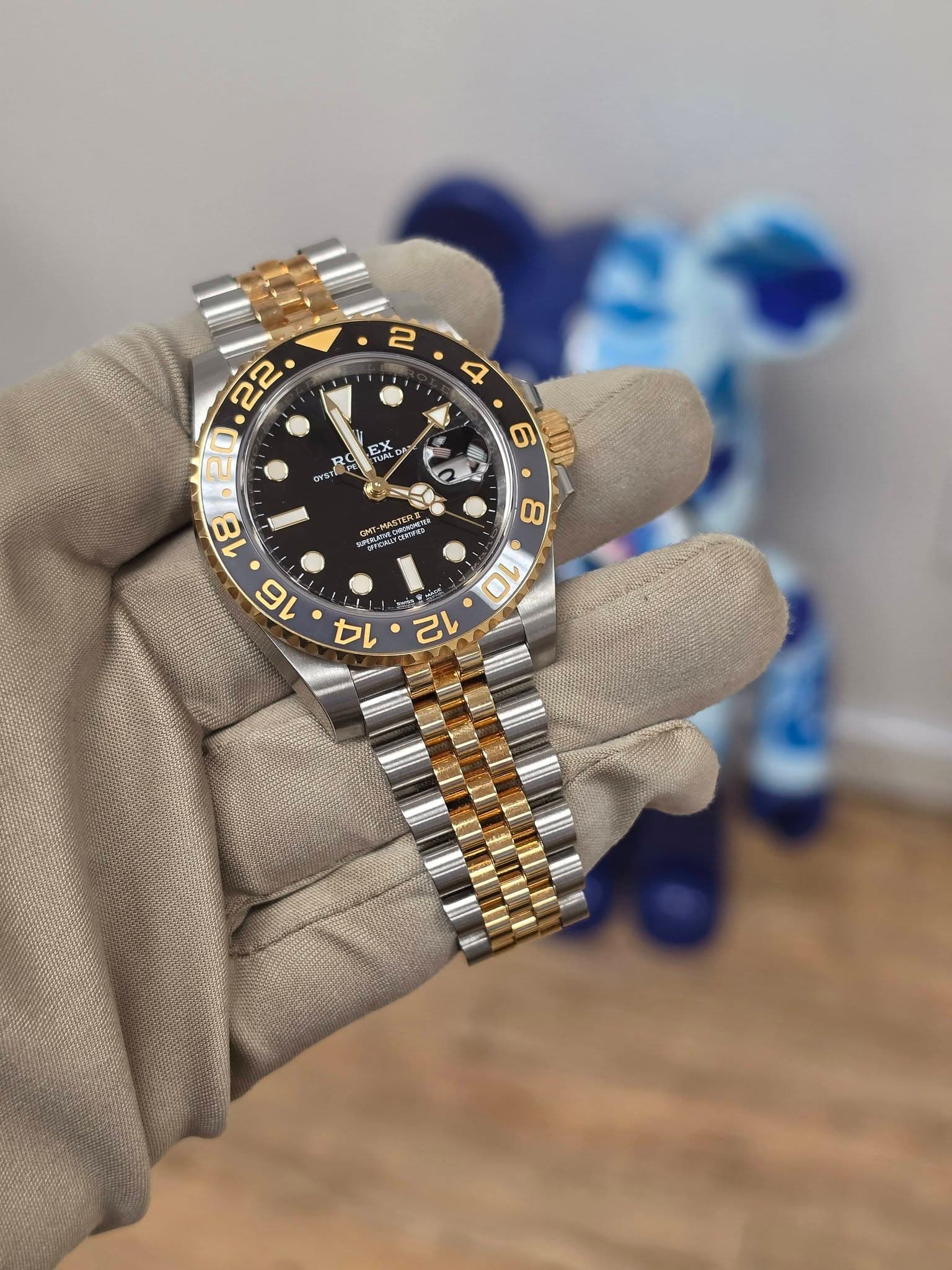 May be an image of wrist watch and text