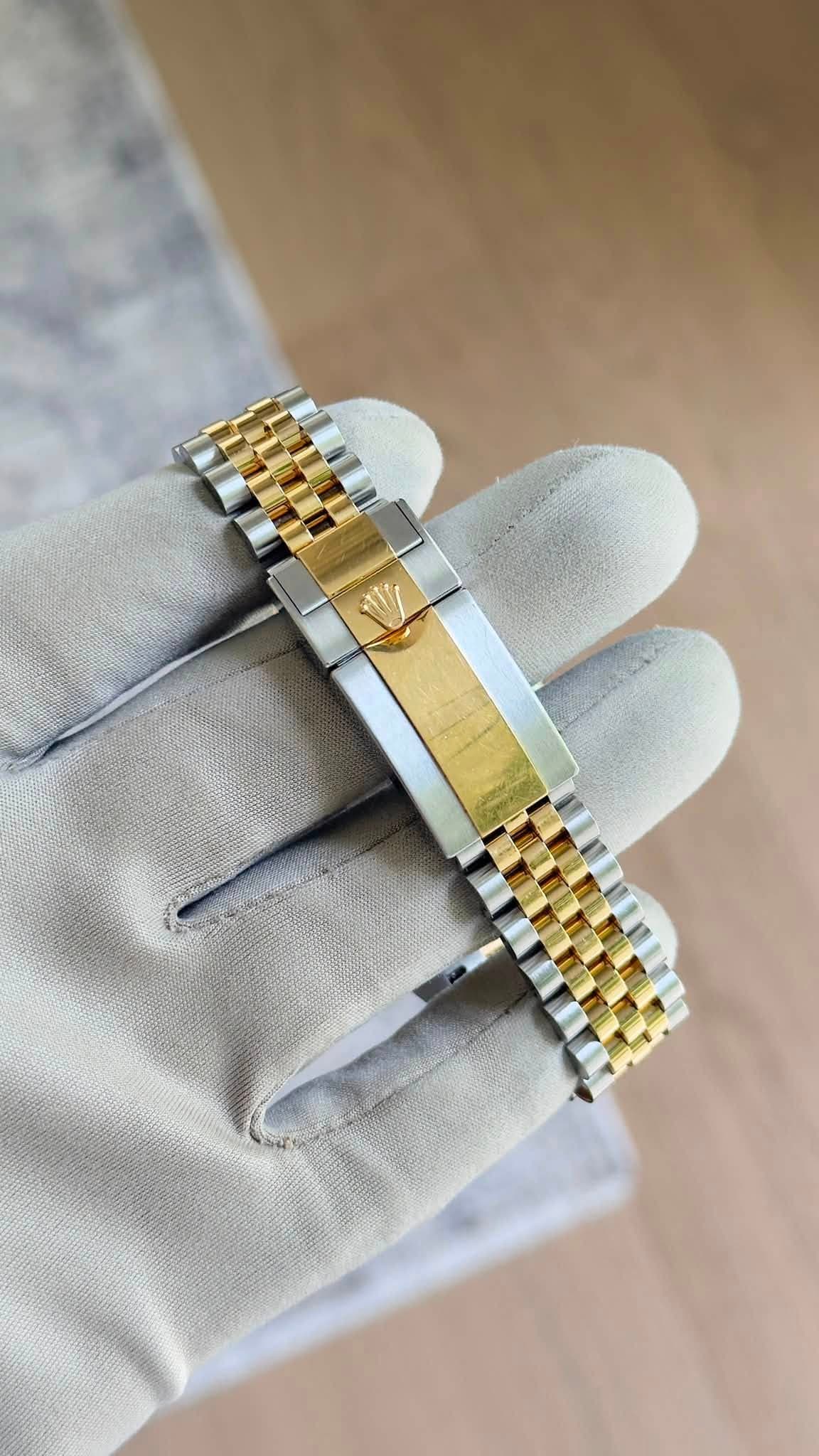 May be an image of wrist watch
