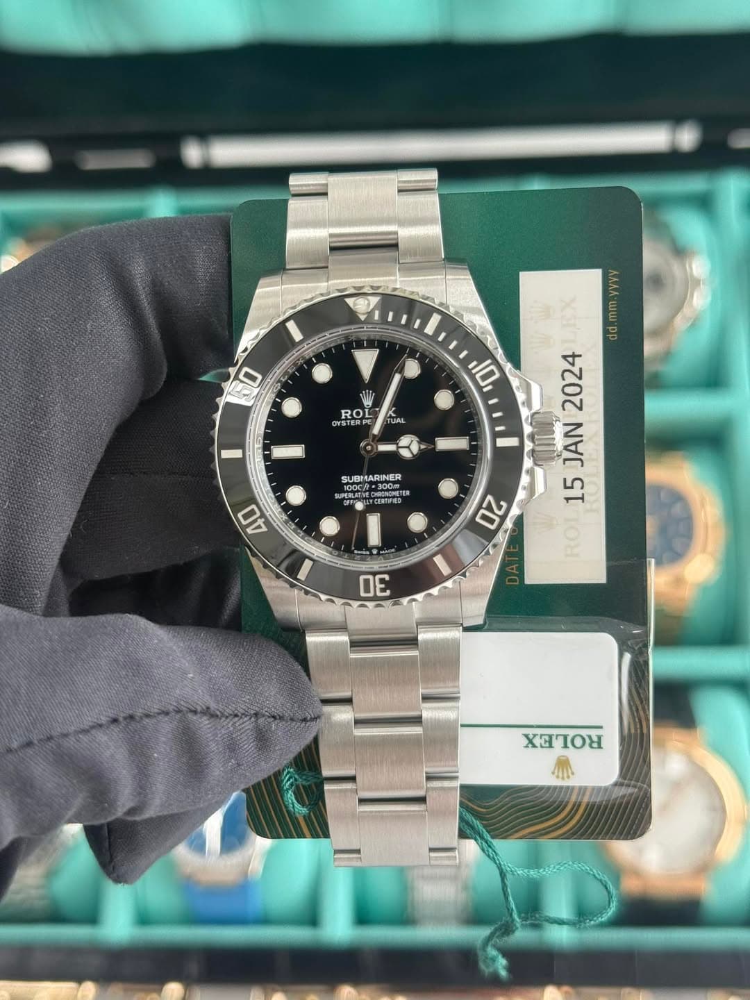 May be an image of wrist watch and text that says '0 W ทีน์ ROL - DWS OWSTER 10 TUAL I AyY AX .mm.y mm dd 2024 15 15JAN2024 JAN ROI SUBMARINER 10CLT CR=300m MNCNPTE SPERATNE…