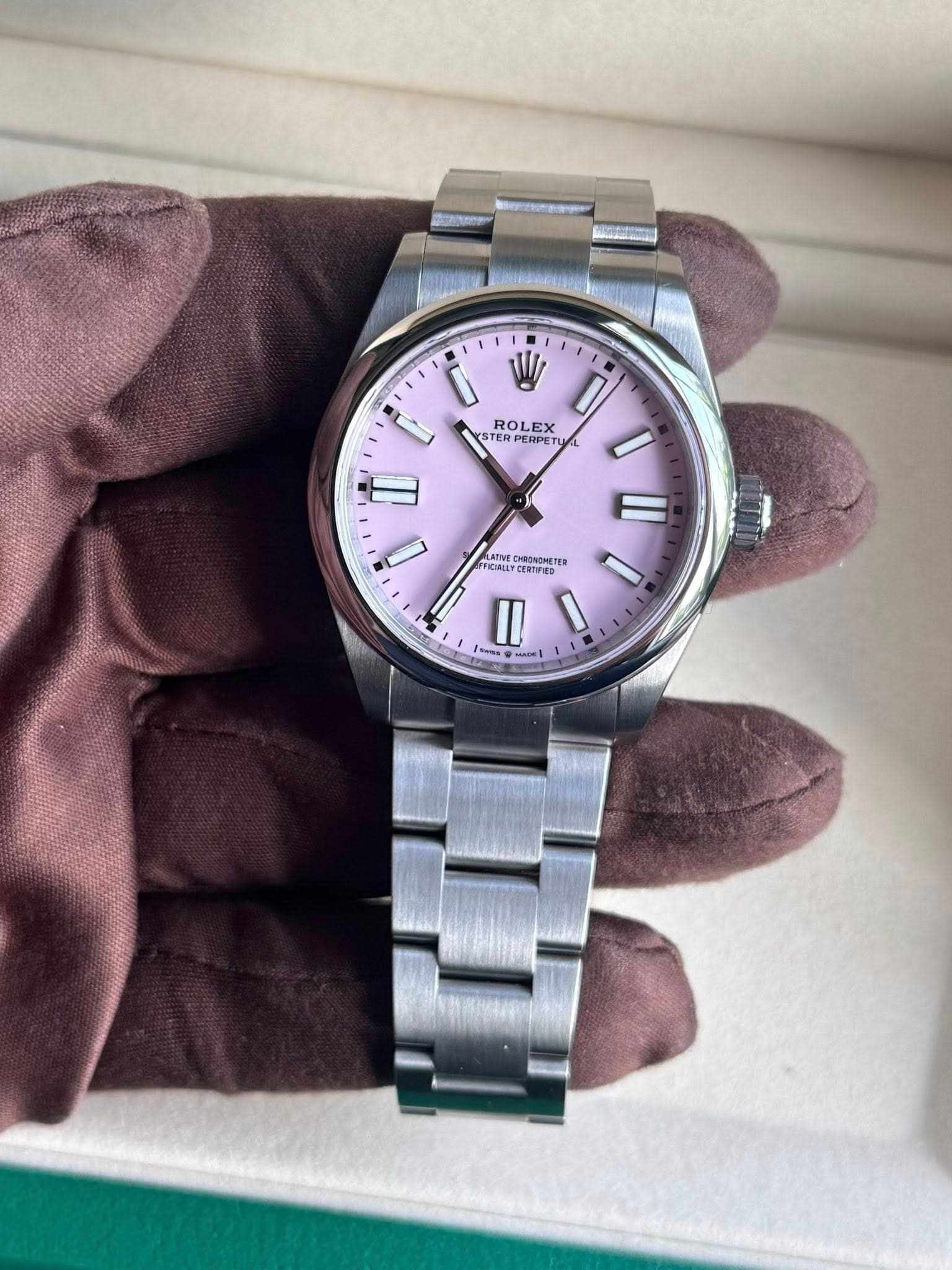 May be an image of wrist watch and text