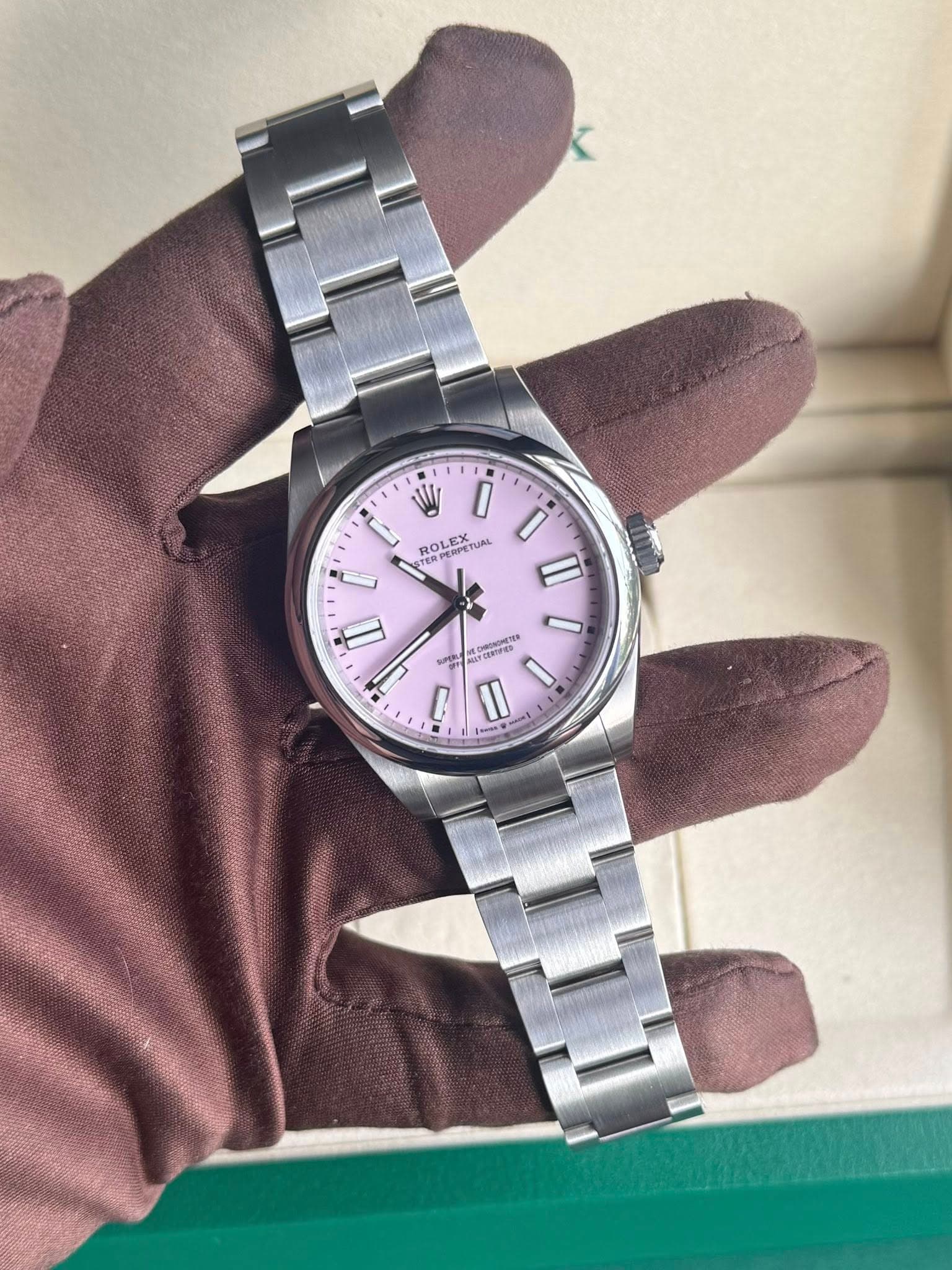 May be an image of wrist watch and text