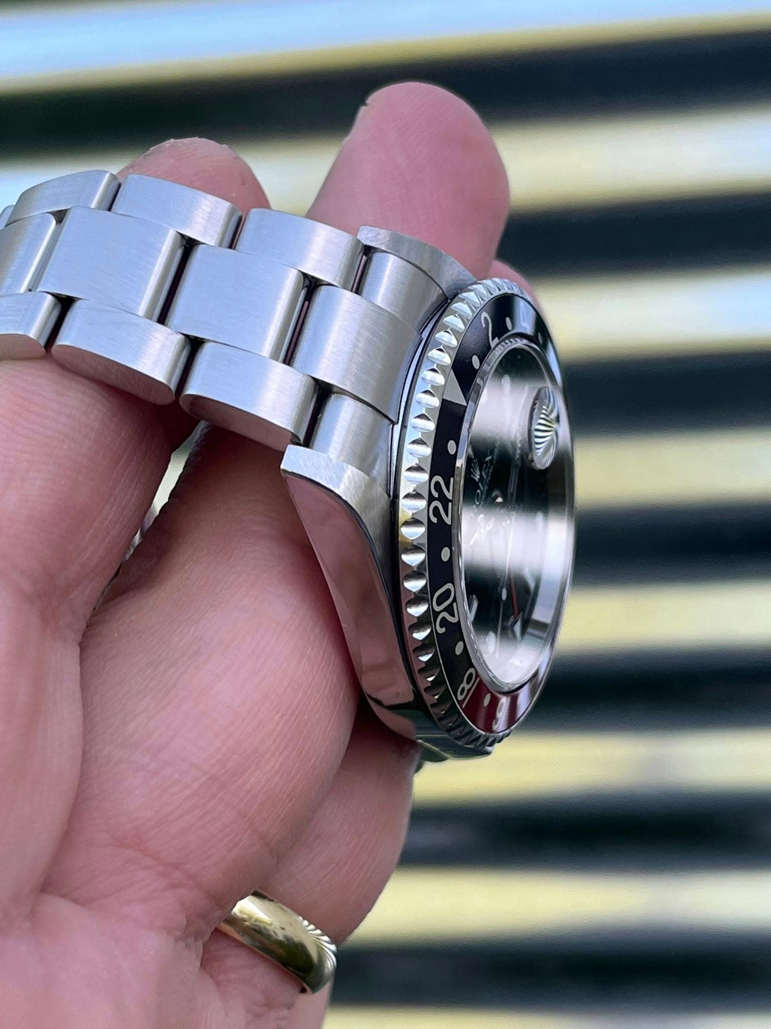 May be an image of wrist watch and text