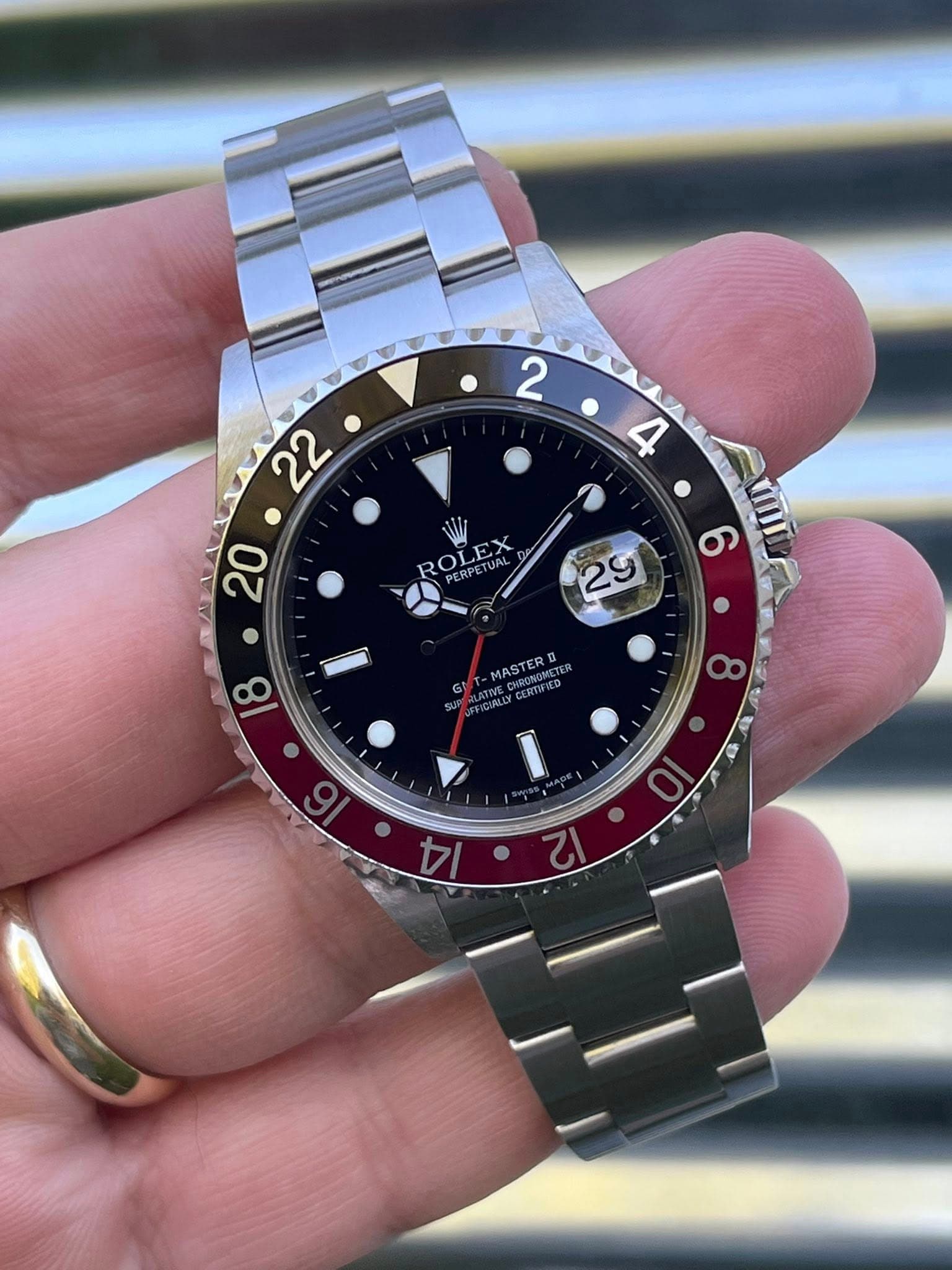 May be an image of wrist watch and text that says ' ROLEX 18 MASTERB CERTUNED ထ 6 O • 12 14'