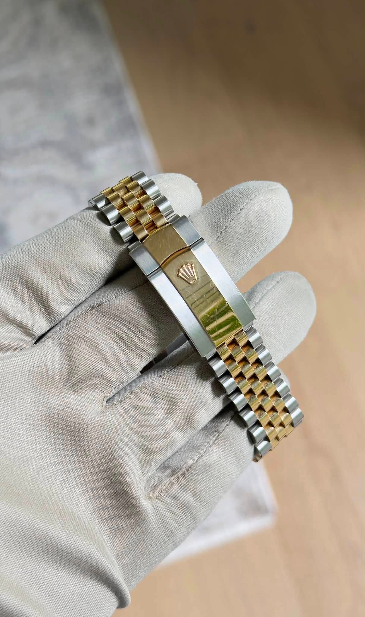 May be an image of wrist watch
