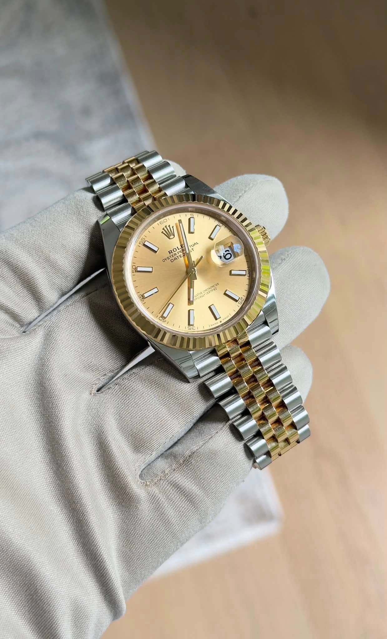 May be an image of wrist watch and text