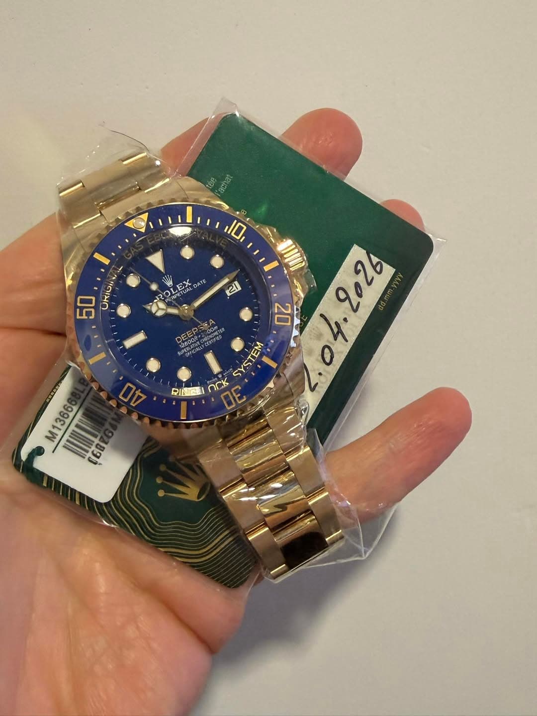 May be an image of wrist watch and text