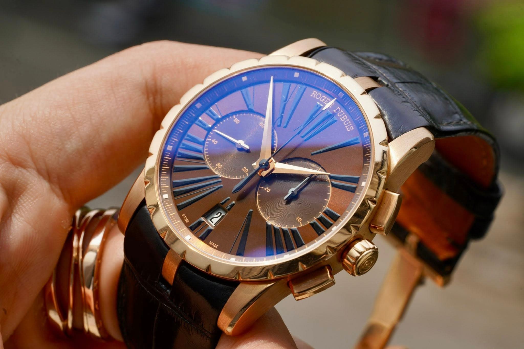 May be an image of wrist watch and text that says 'ROGE RO OGE 5 DUBUIS DUBUIS ㅎ 30 20 20 pnηpa SULALS N 10 MADE MADIE'