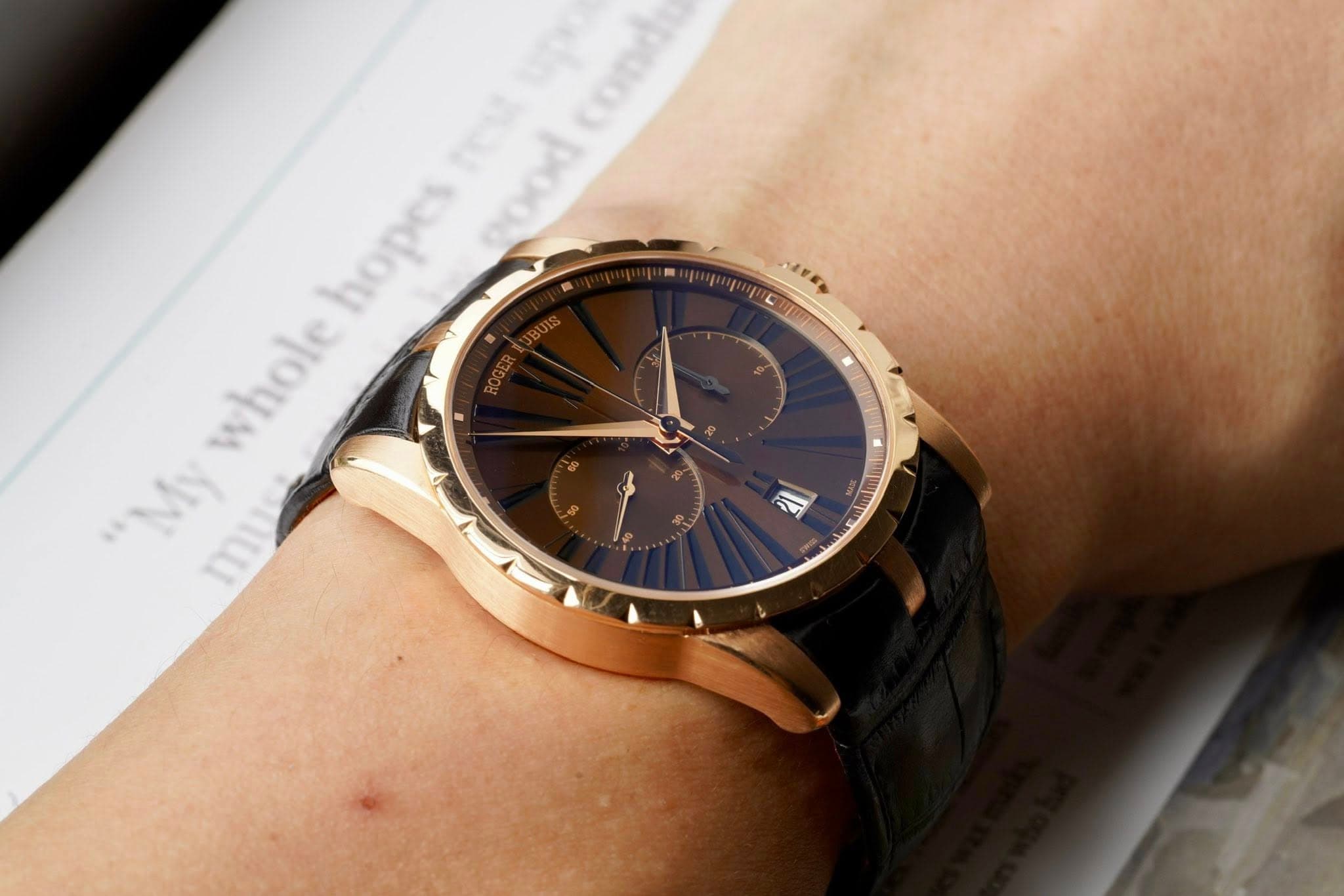 May be an image of wrist watch and text that says 'NIEH LEK hopes whole "My mue mU'