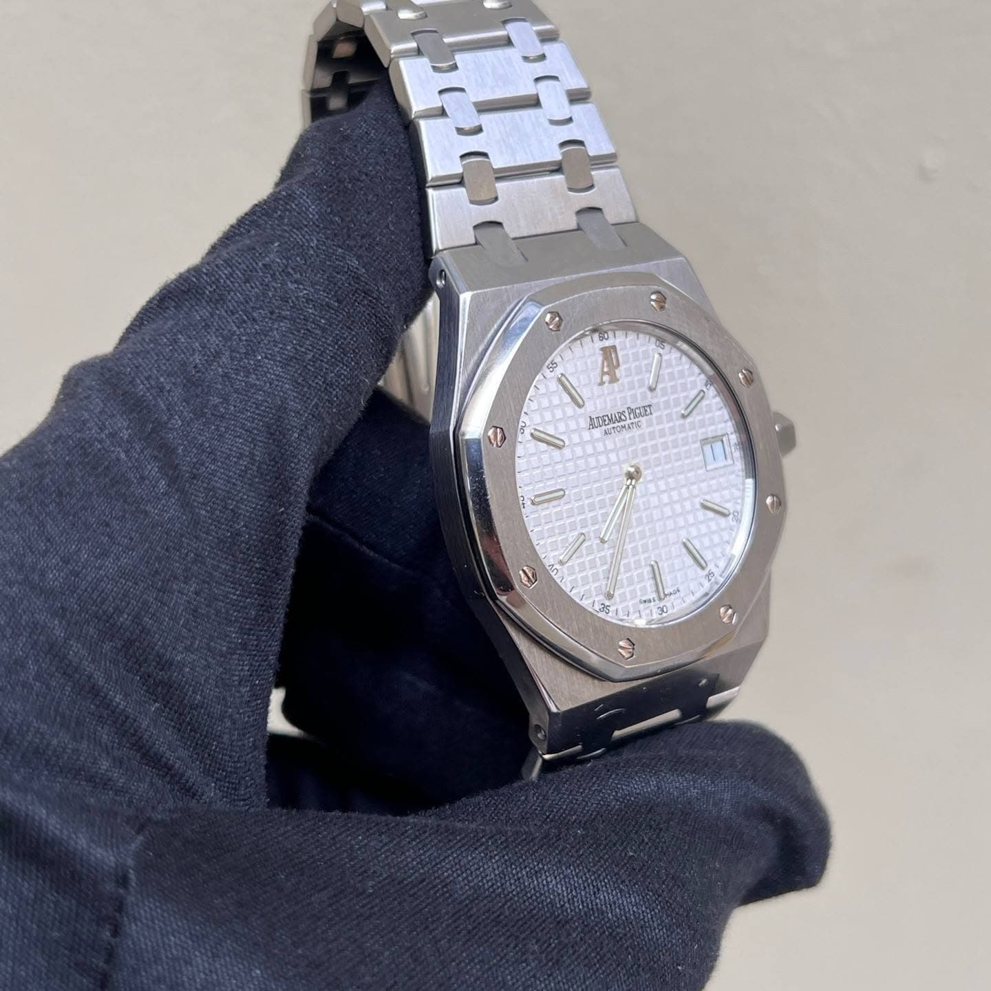 May be an image of wrist watch and text