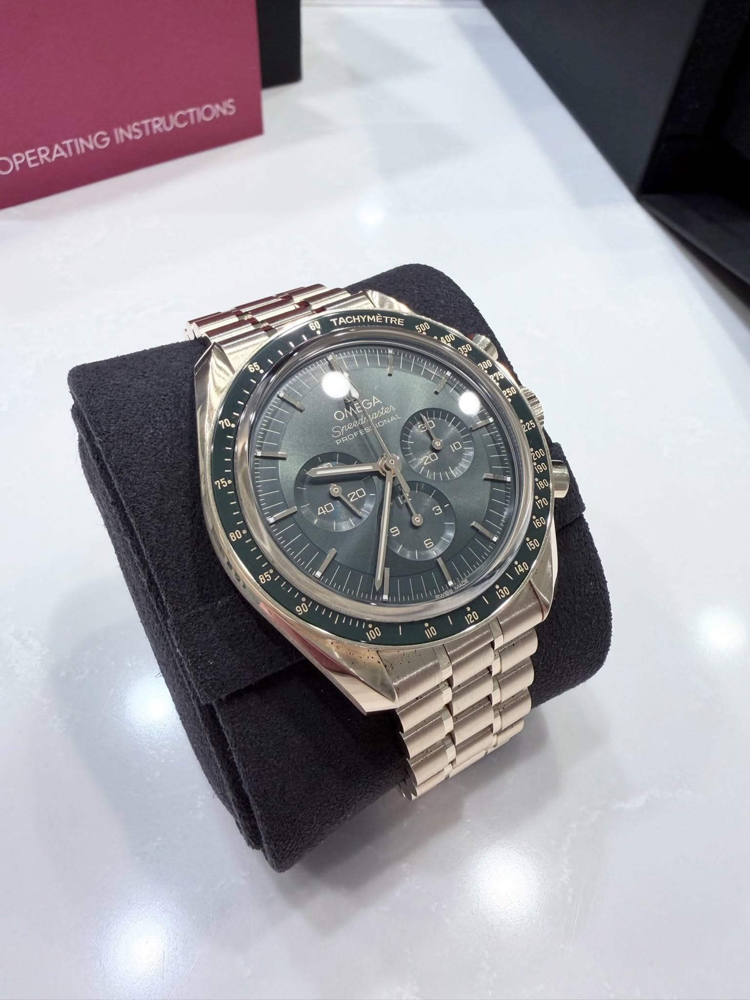 May be an image of wrist watch and text