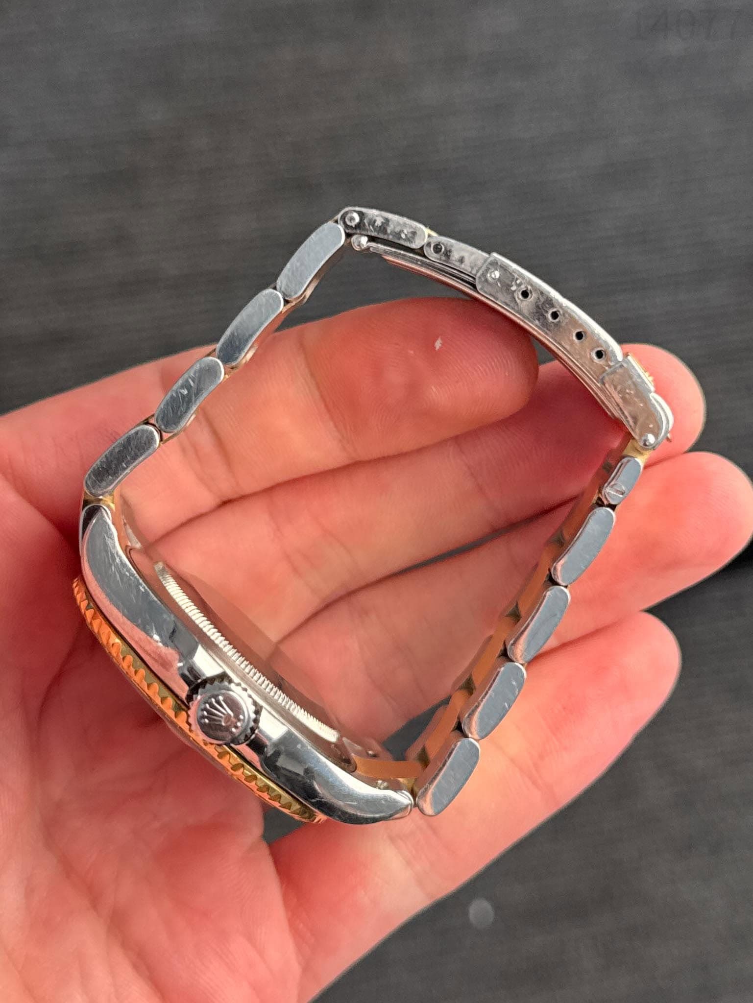 May be an image of jewelry and wrist watch