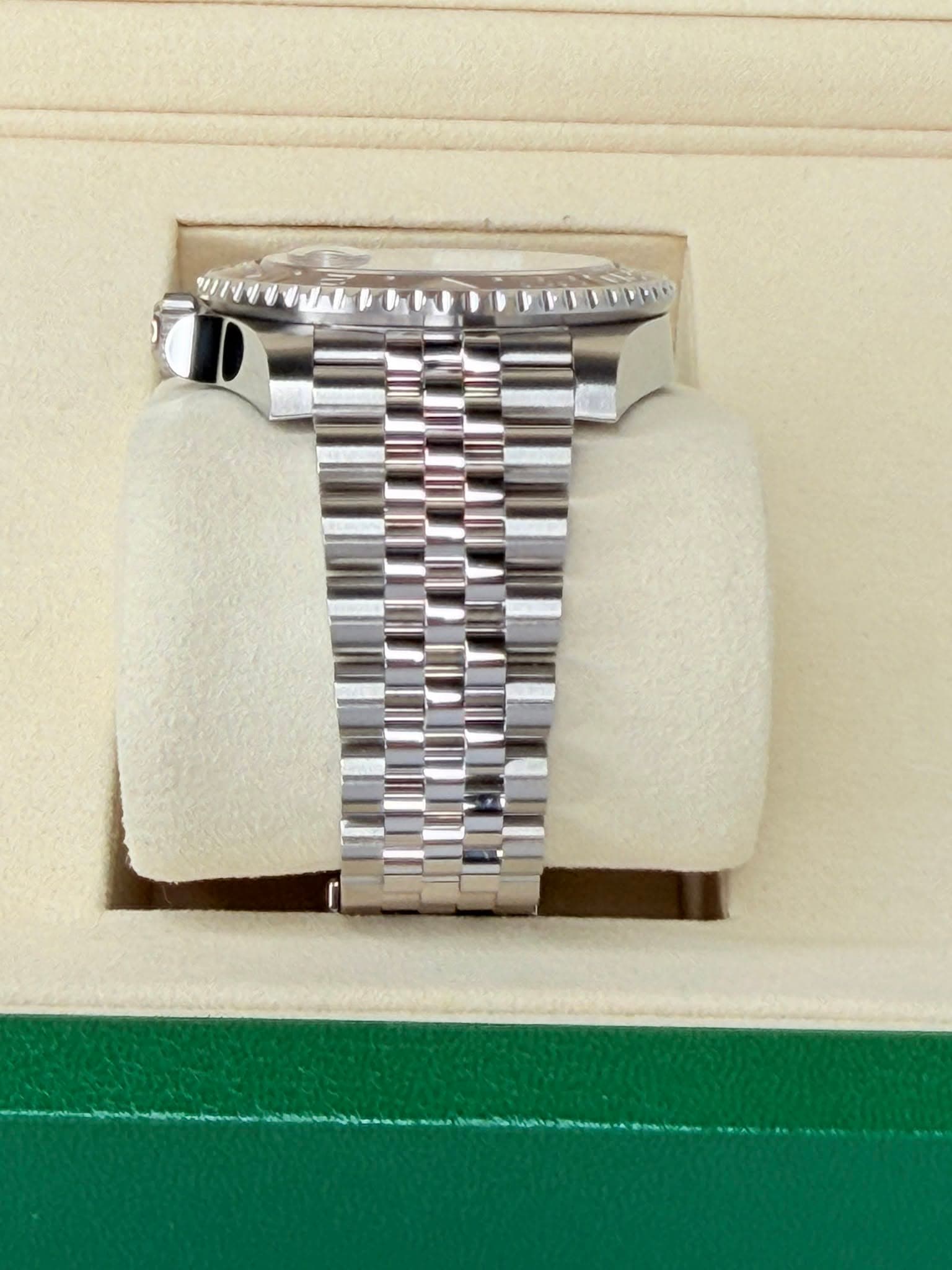May be an image of wrist watch and text