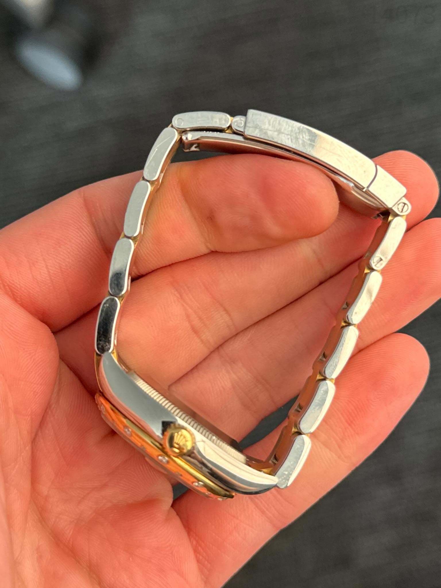 May be an image of wrist watch