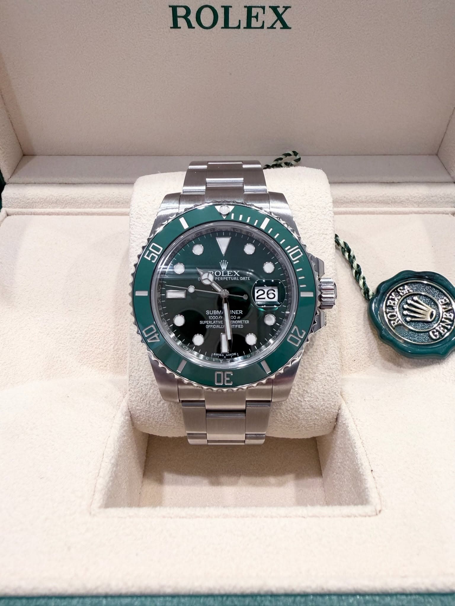 May be an image of wrist watch and text