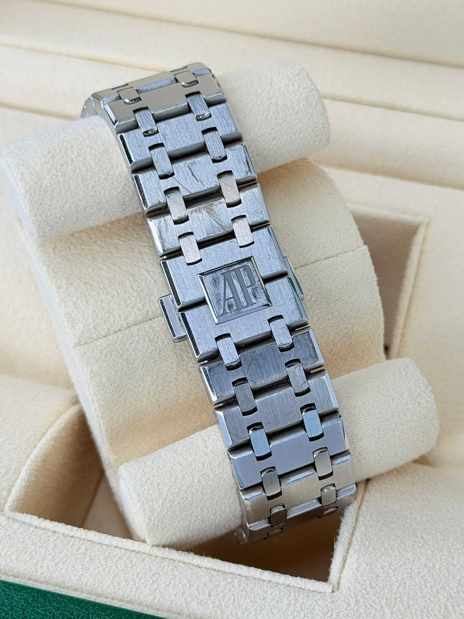 May be an image of wrist watch and jewelry