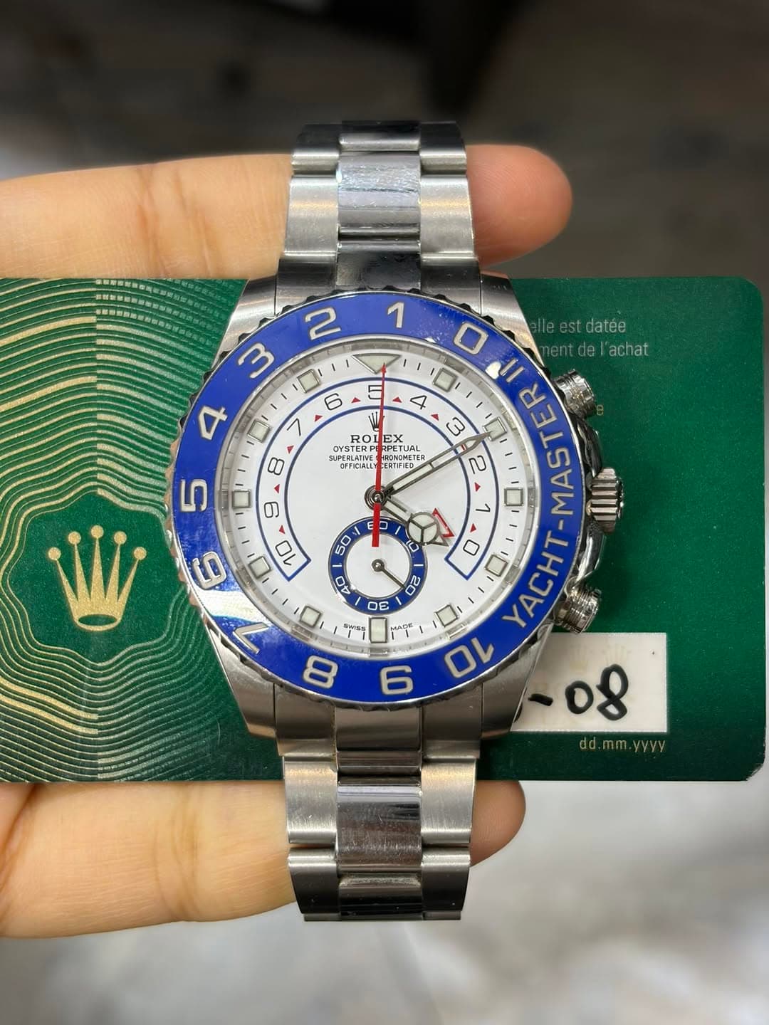 May be an image of wrist watch and text