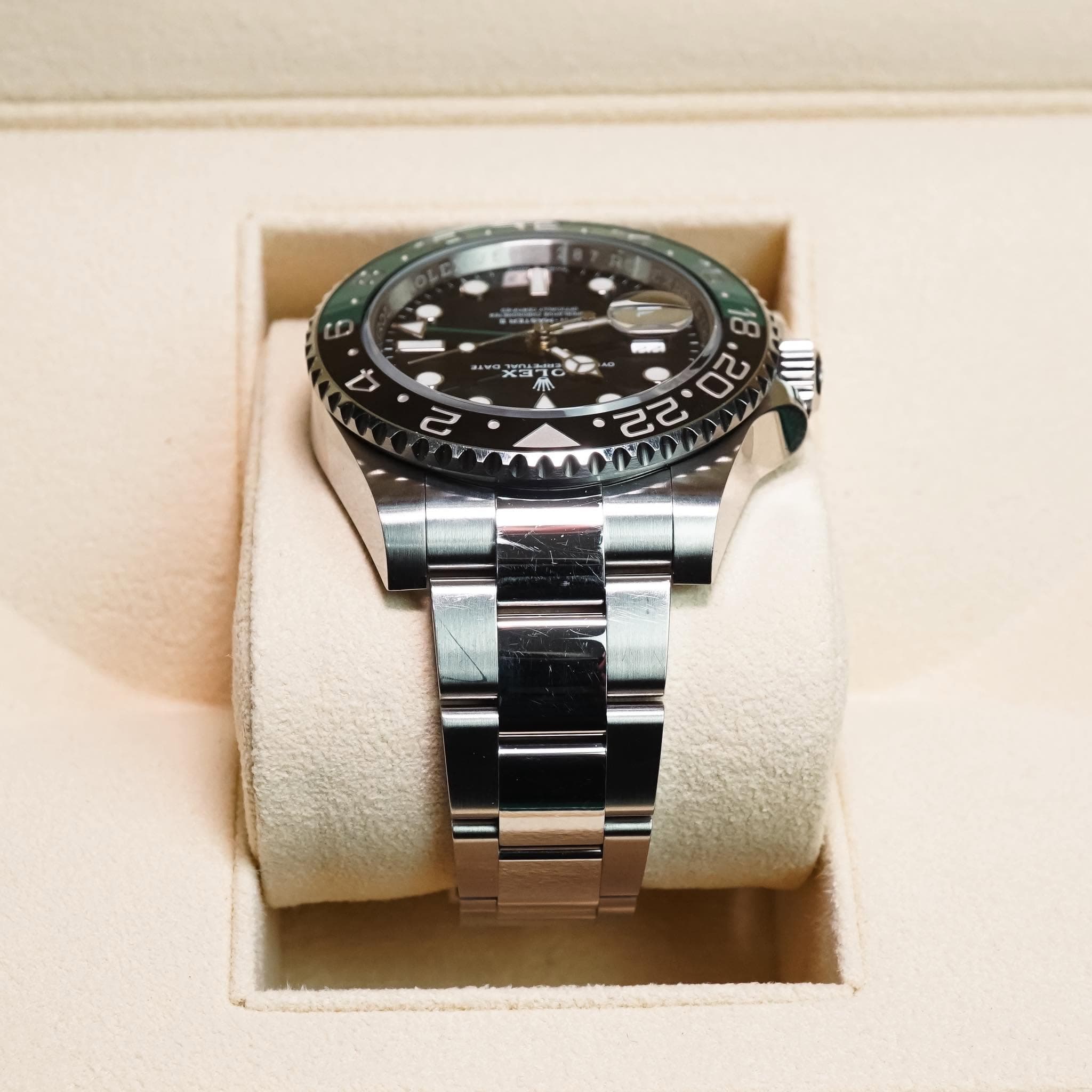 May be an image of wrist watch and text