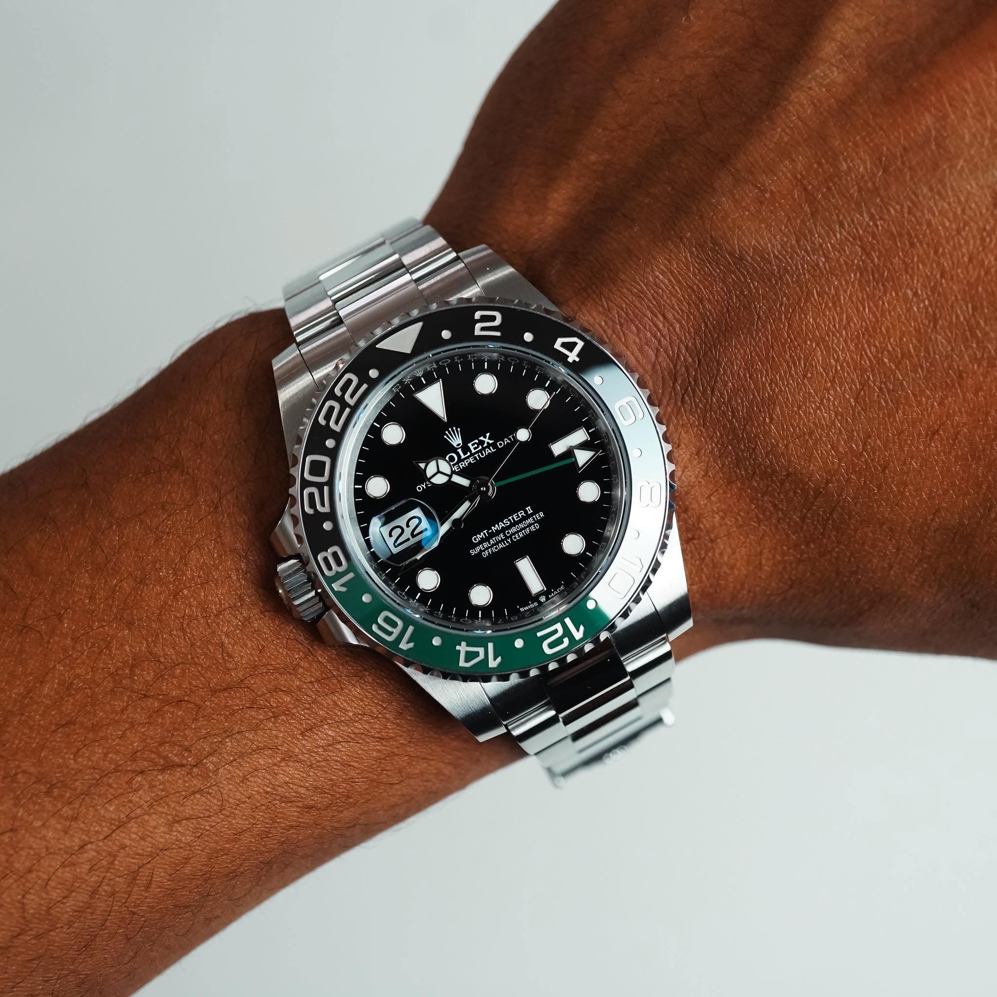 May be an image of wrist watch and text