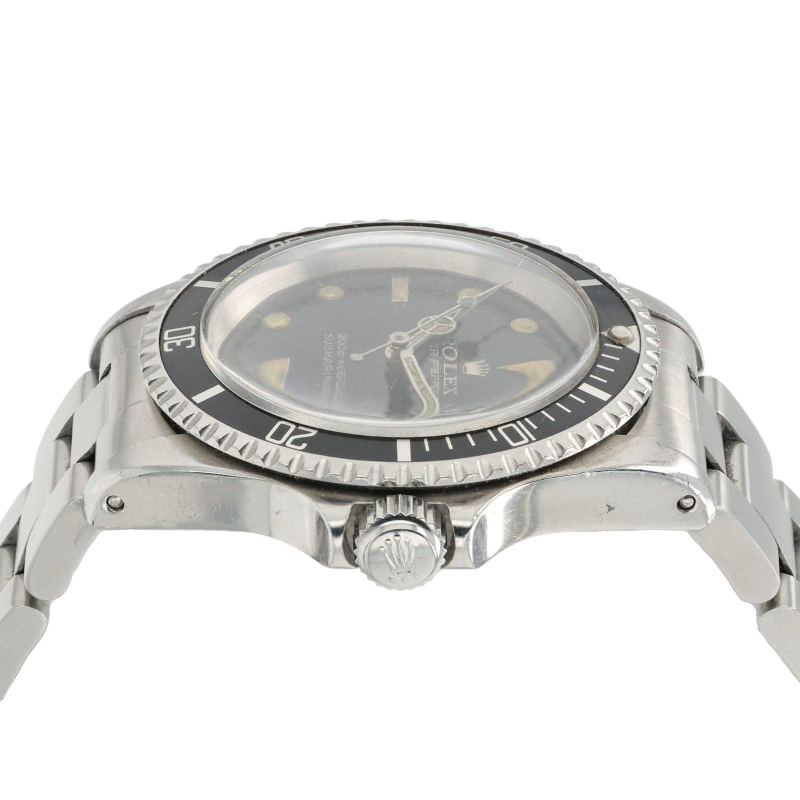 May be an image of wrist watch and text that says '30 LOTO OR አ 0 20'