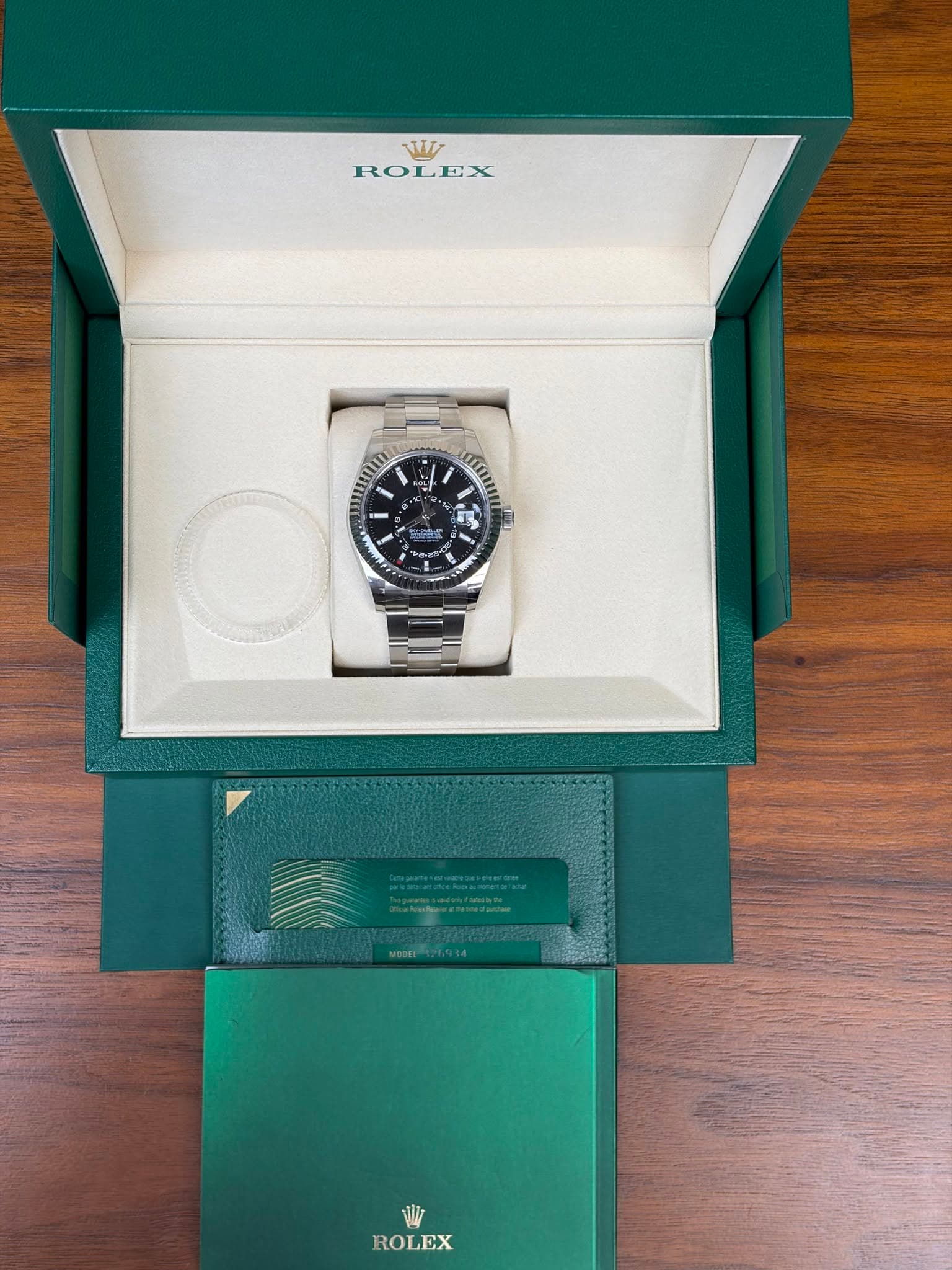 May be an image of wrist watch and text