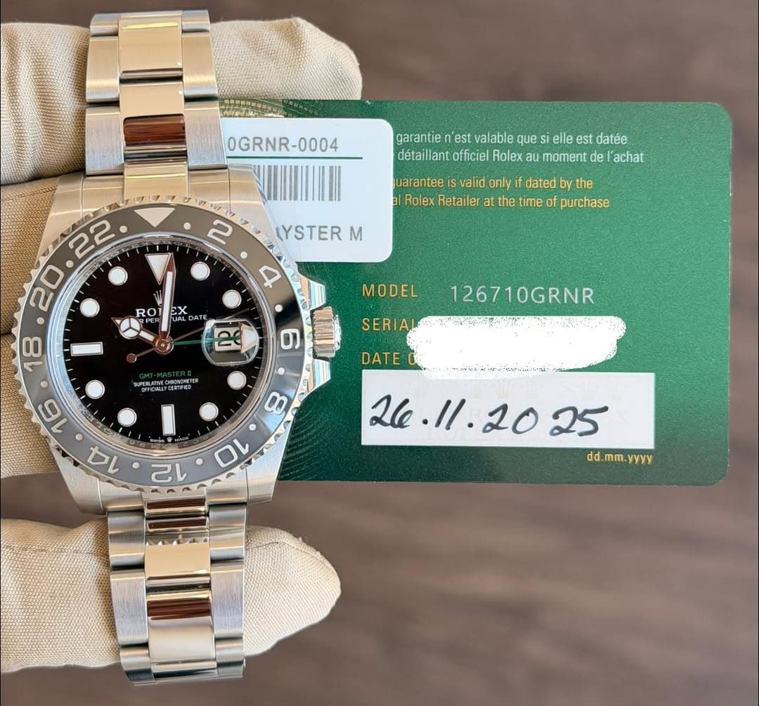 May be an image of wrist watch and text that says 'OGRNR-0004 OGRN garantie n'est valable que si sie iell elle est datée detaillant officiel Rolex moment de l'achat 2 juarantee…