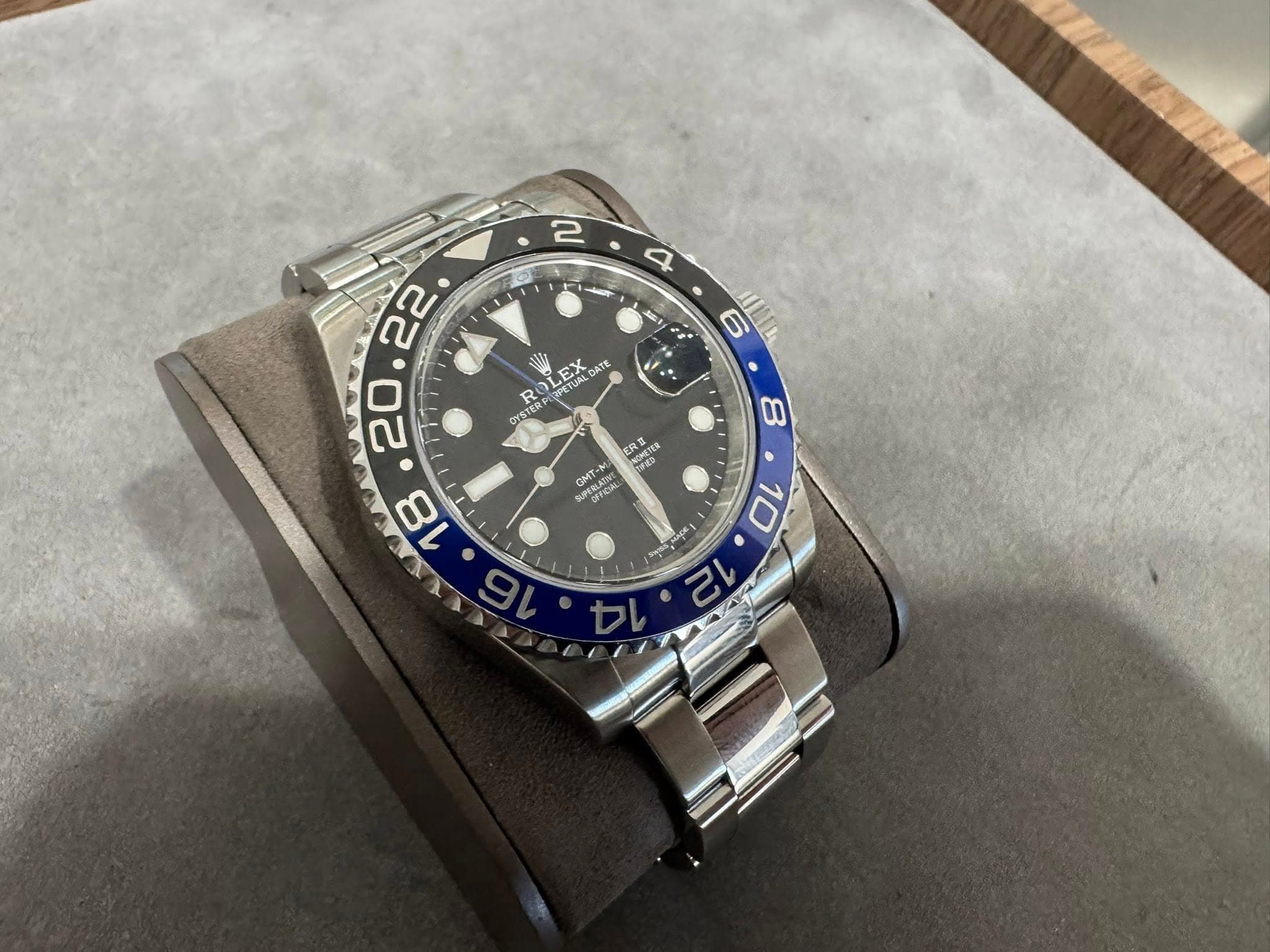 May be an image of wrist watch and text
