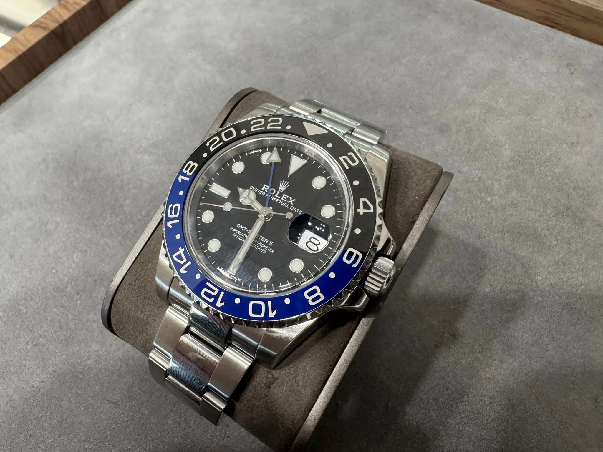 May be an image of wrist watch and text