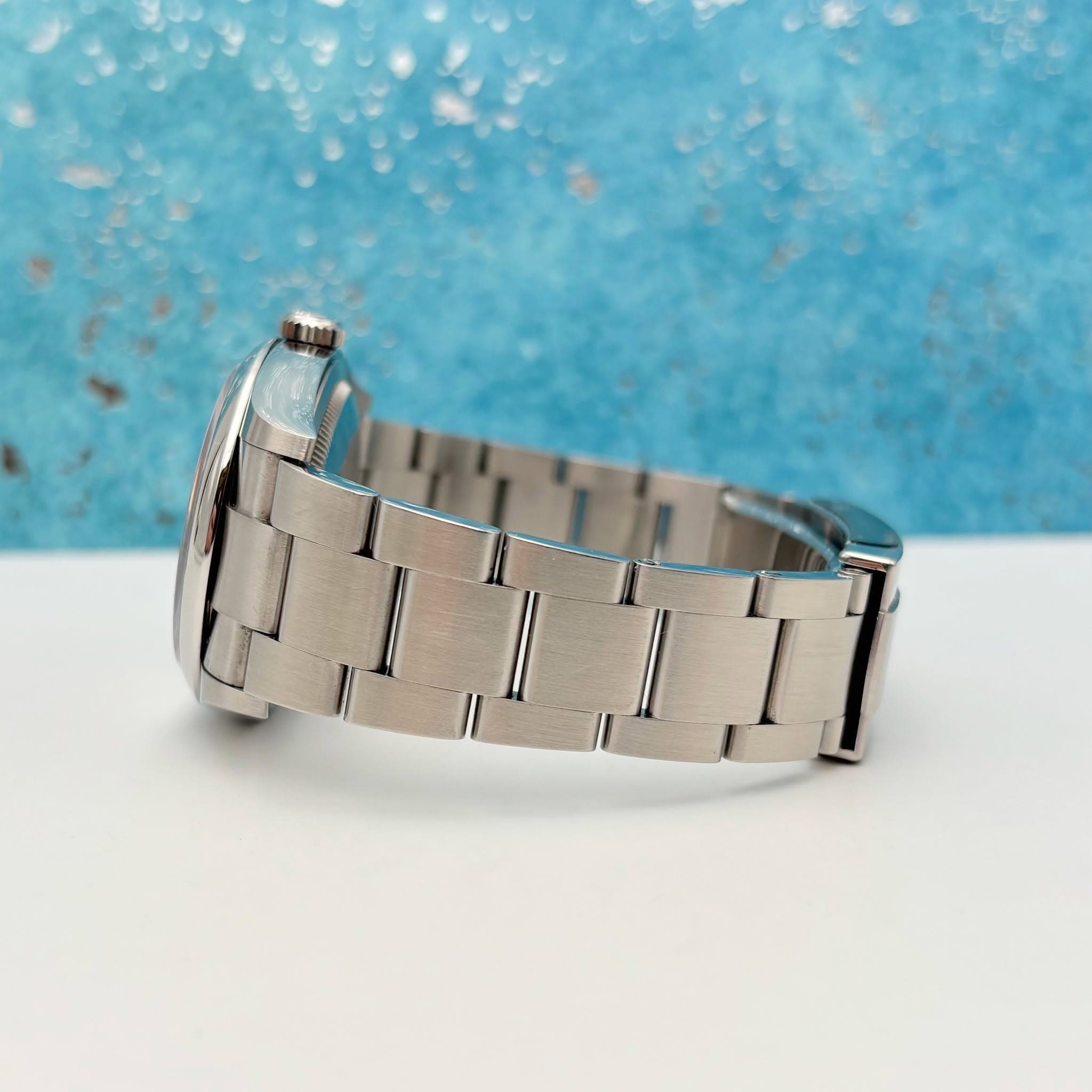 May be an image of wrist watch