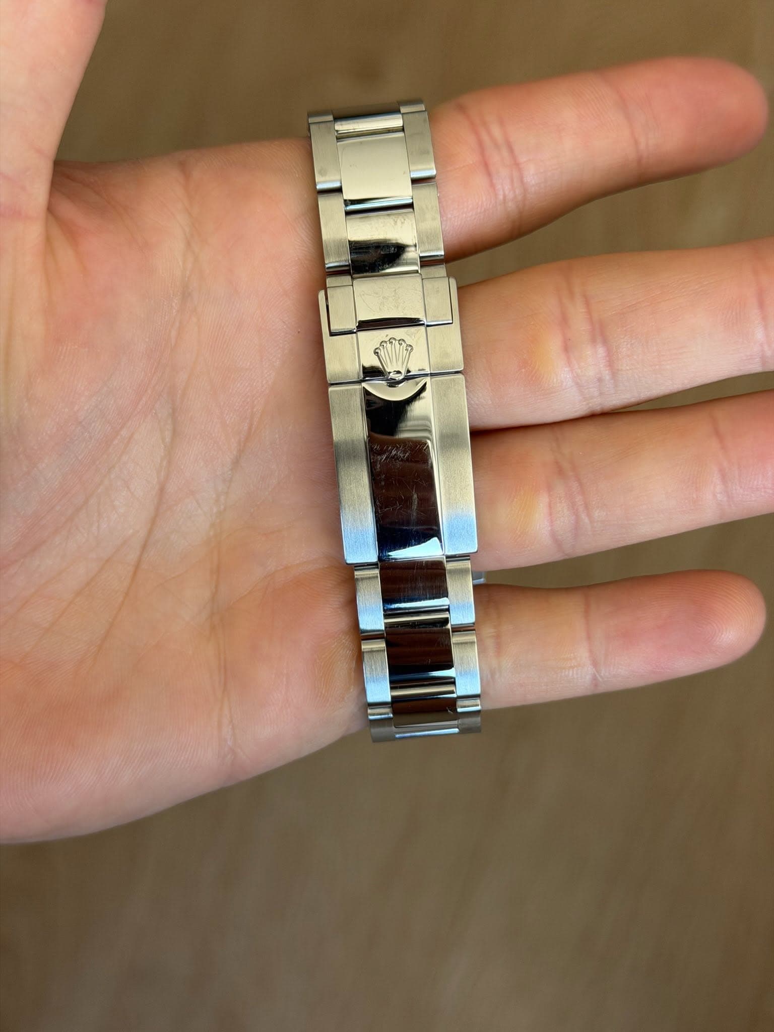 May be an image of wrist watch