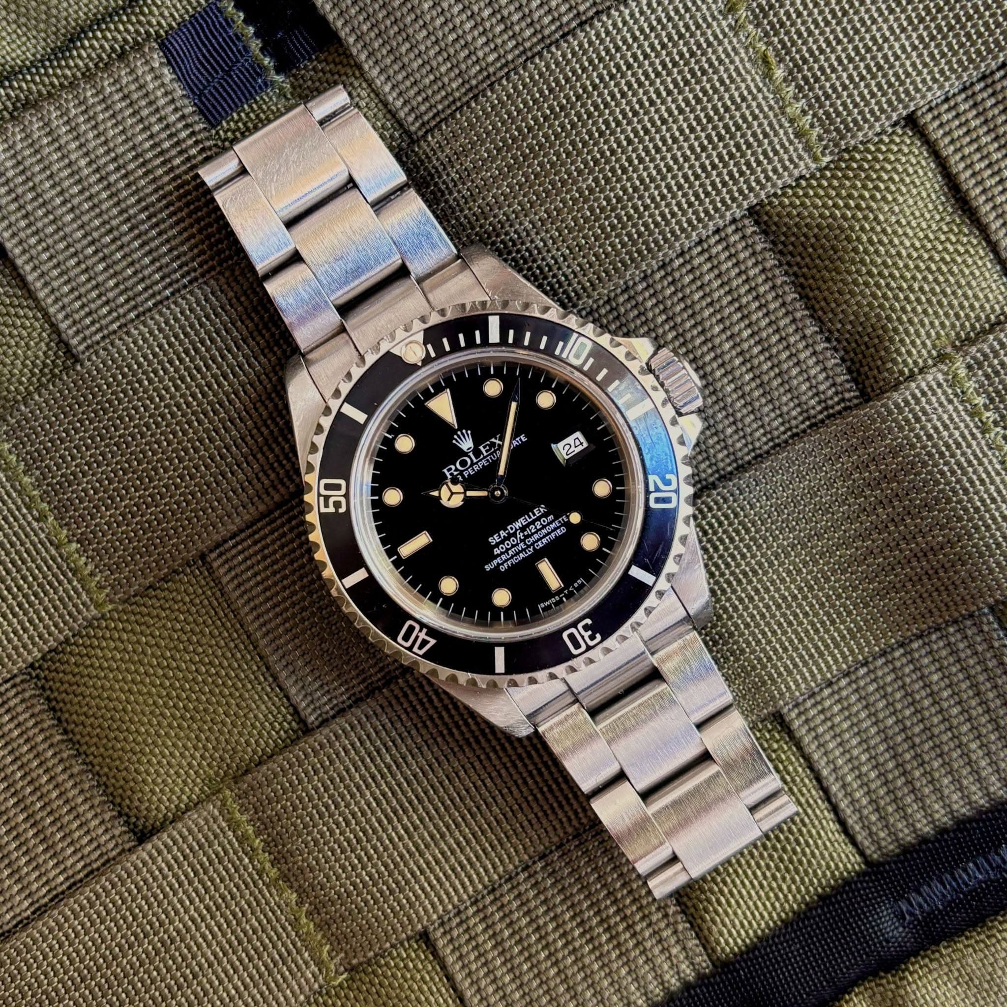May be an image of wrist watch and text