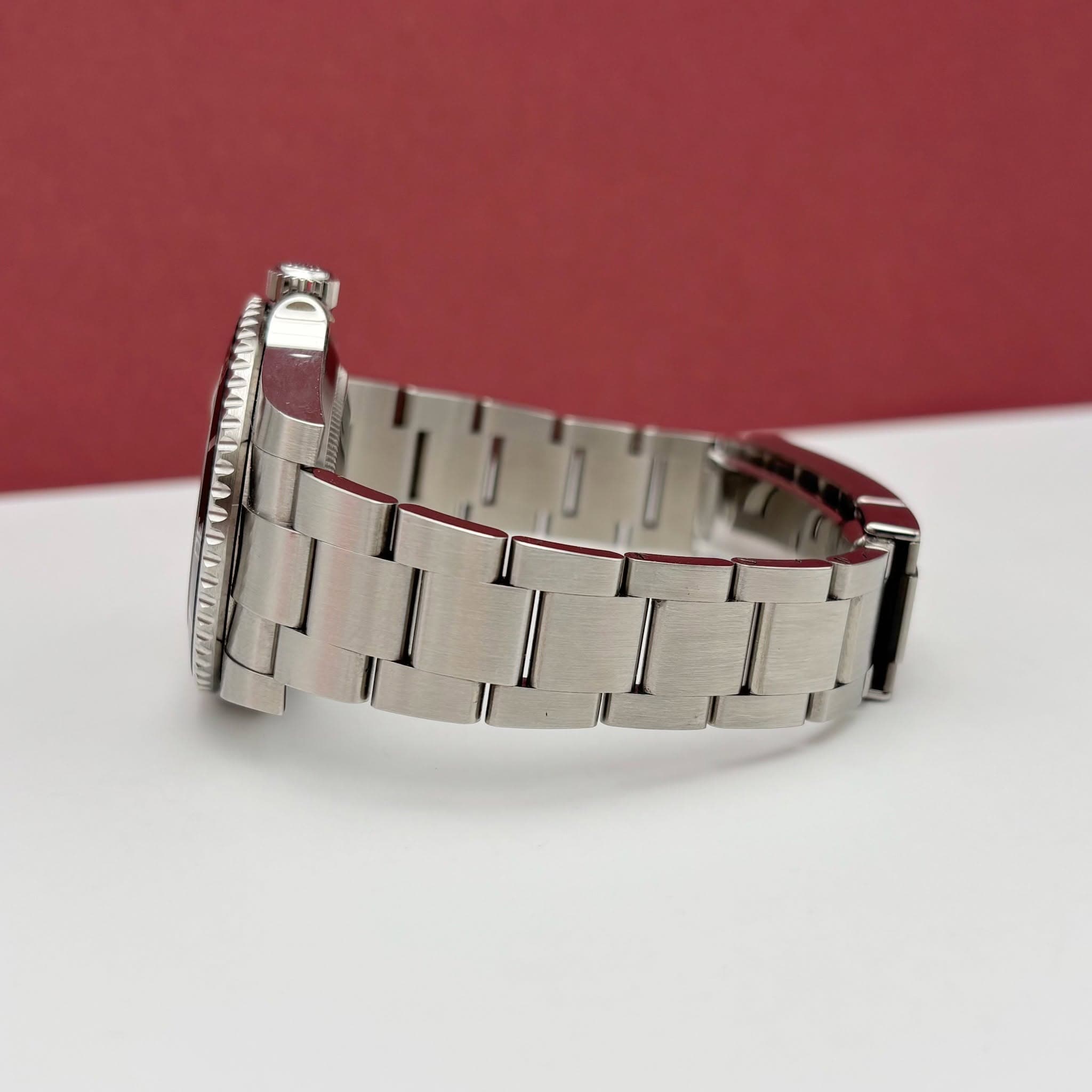May be an image of wrist watch and text