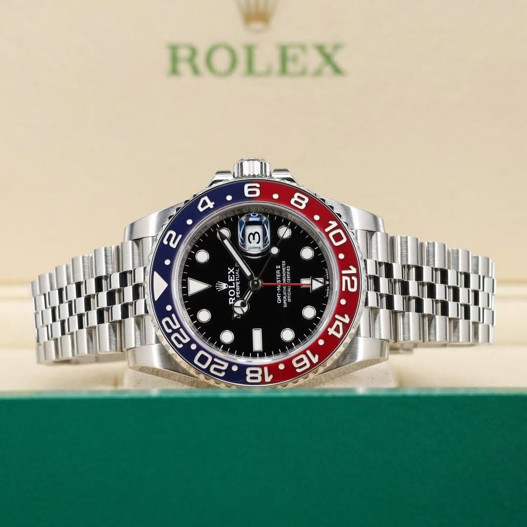 May be an image of wrist watch and text