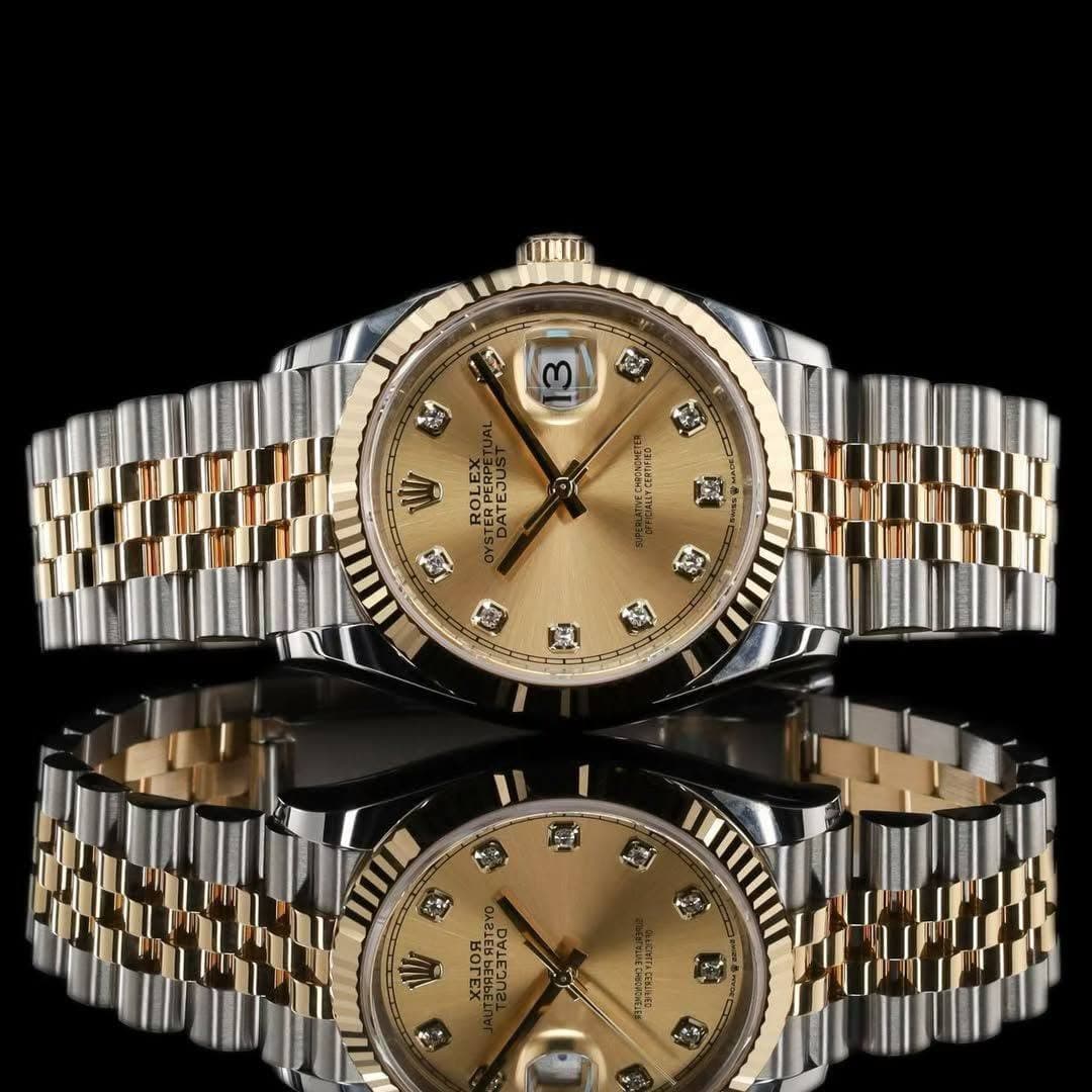 May be an image of wrist watch and text