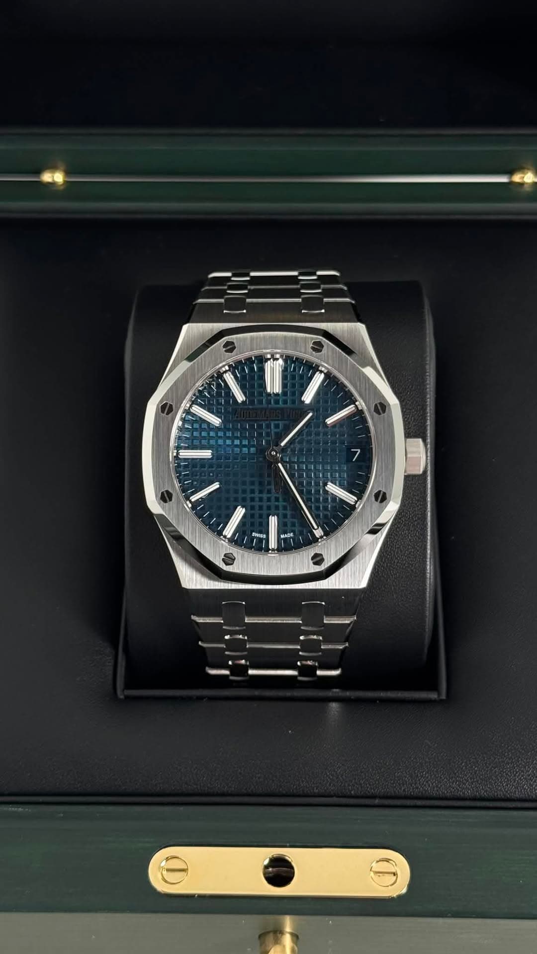 May be an image of wrist watch and text