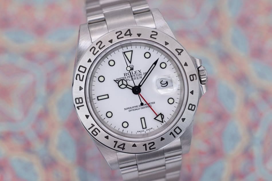 May be an image of wrist watch and text that says '24 2 22 O o o 4 O 20 Ali LEX DETUAL DE REPETUA ROLEX RO OYSTERPE OYSTERPLORER RPE RER O ETER SUPERLATIVE OFFICIALLYCER CERTIFI I…