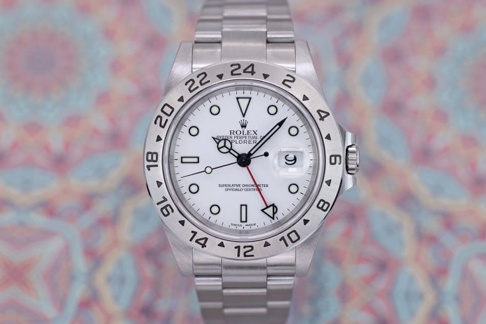 May be an image of wrist watch and text that says ' ح 2 20 o O 4 o O Wiz ROLEX DYSTERPERPETUAL EX OYSTERPE PLORER LORE 18 y 6 Παυ SUPERLATIVE CHRONG ETER OFFICIALLY FICALLYCERTI…